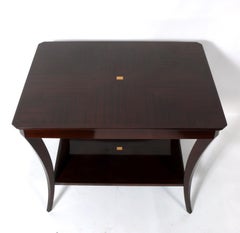 Table élégante à pieds évasés à la manière de Tommi Parzinger