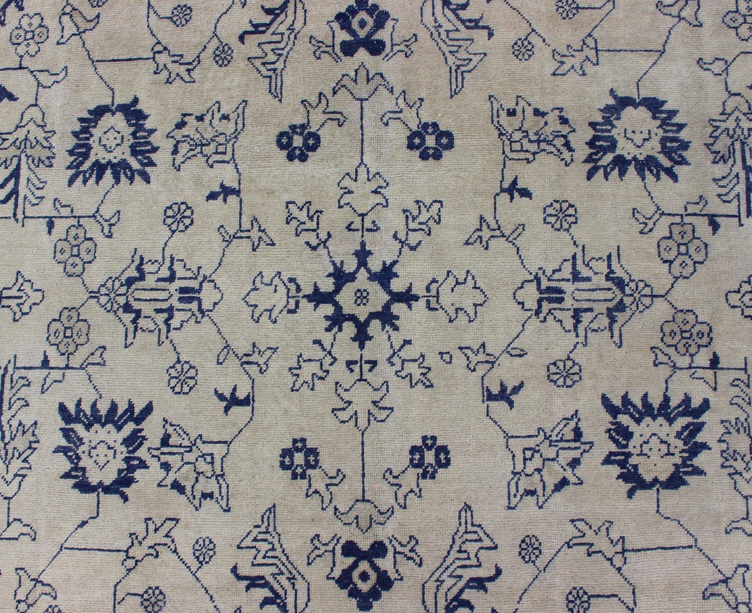 Elegant Floral Vintage Oushak in Blue and Cream with All-Over Design In Good Condition For Sale In Atlanta, GA