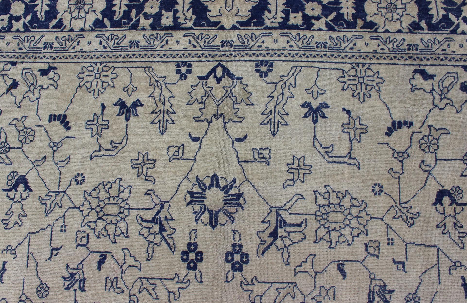 Mid-20th Century Elegant Floral Vintage Oushak in Blue and Cream with All-Over Design For Sale