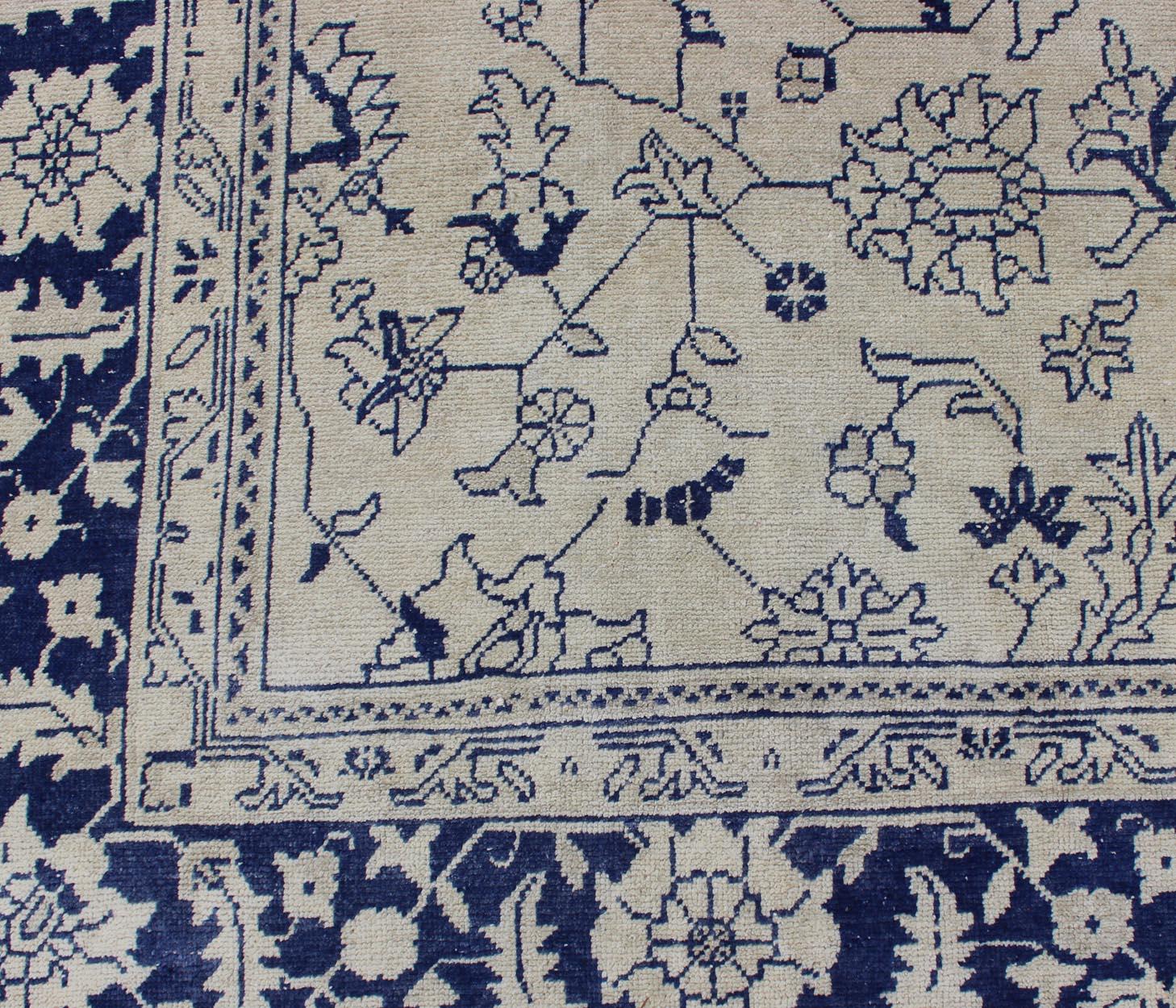 Wool Elegant Floral Vintage Oushak in Blue and Cream with All-Over Design For Sale