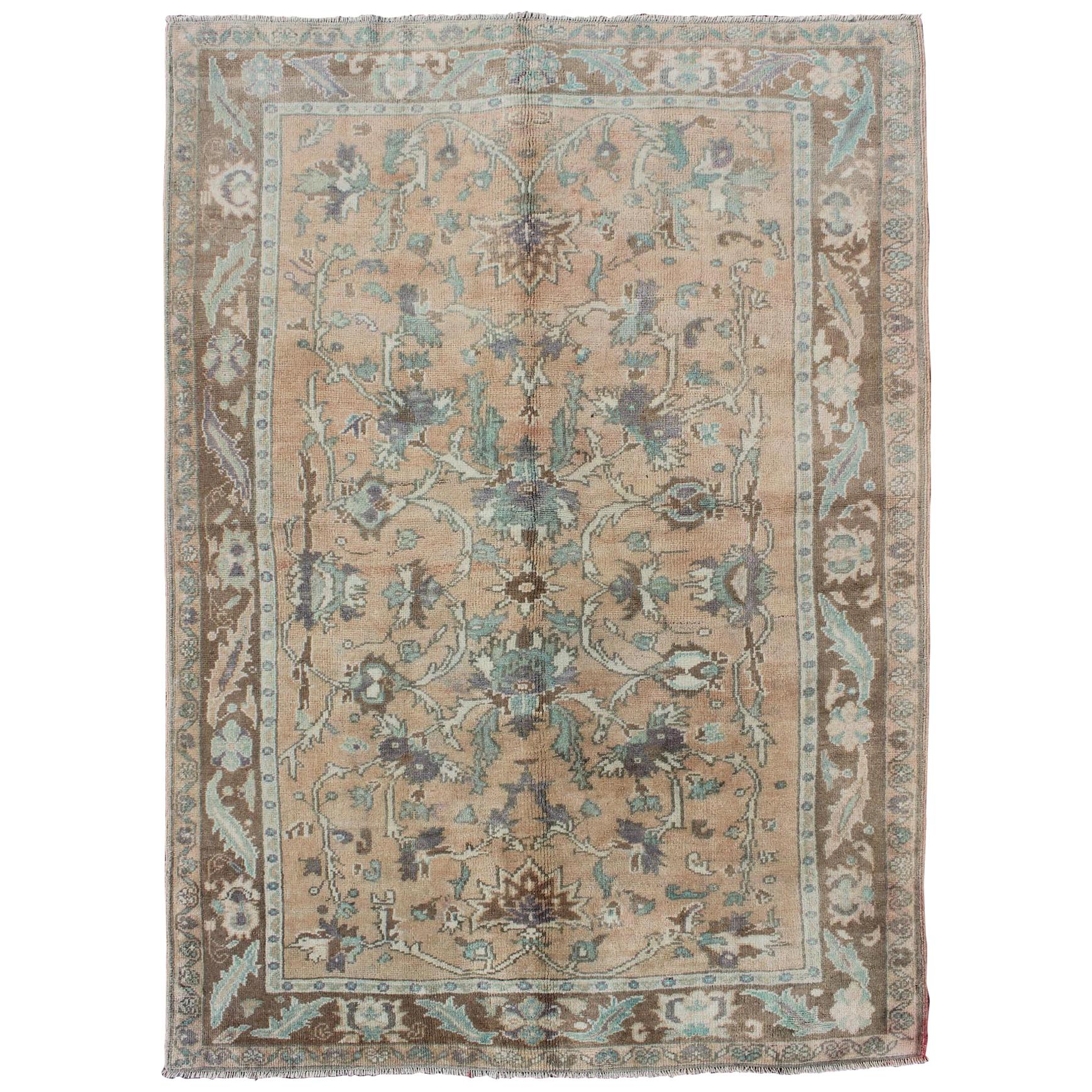Elegant Floral Vintage Turkish Oushak Rug in Cream, Green, Light Peach and Brown For Sale