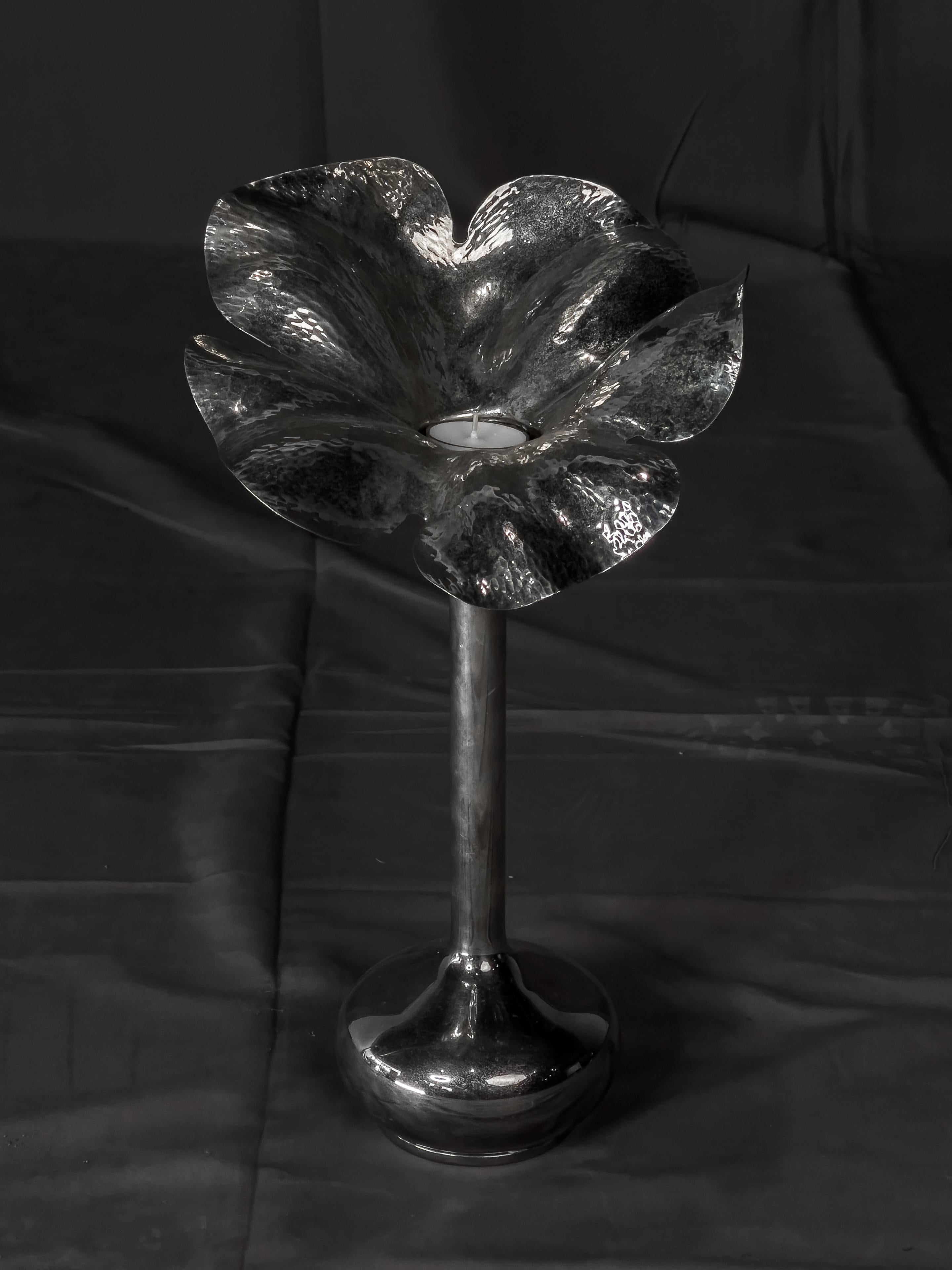 Handmade fancy Silverplate  Floriform vase. Silver plate over brass by the noted 20th century Brazilian gold-smith M.M. Evolucao and so signed on the bottom along with his trade mark.   

This is a great vintage piece.  We also have posted a second