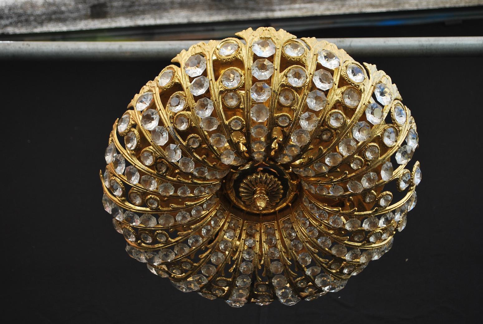 A beautiful 1970s flush mount light, the design is quite unusual.

     
