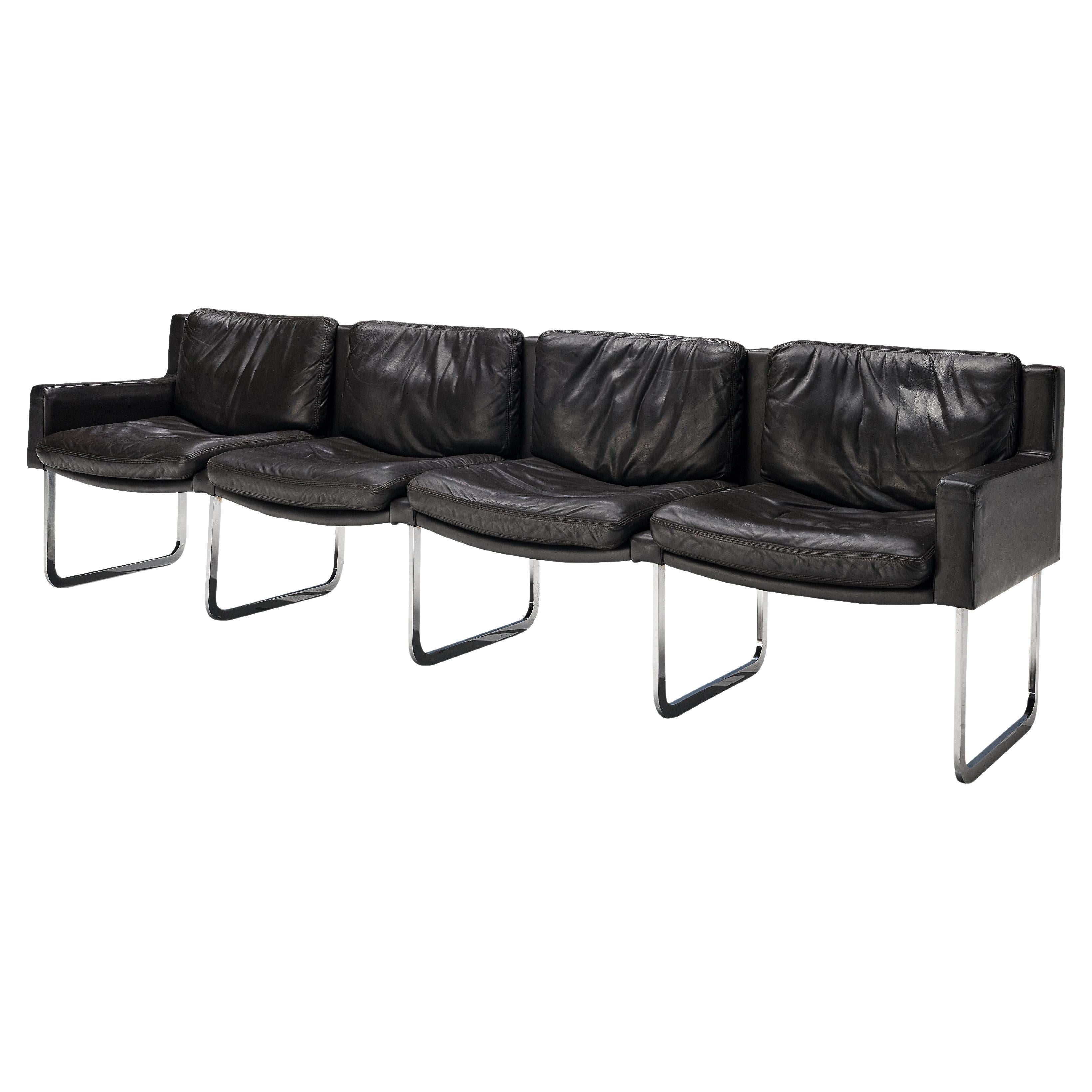 Elegant Four-Seat Sofa in Black Leather and Steel