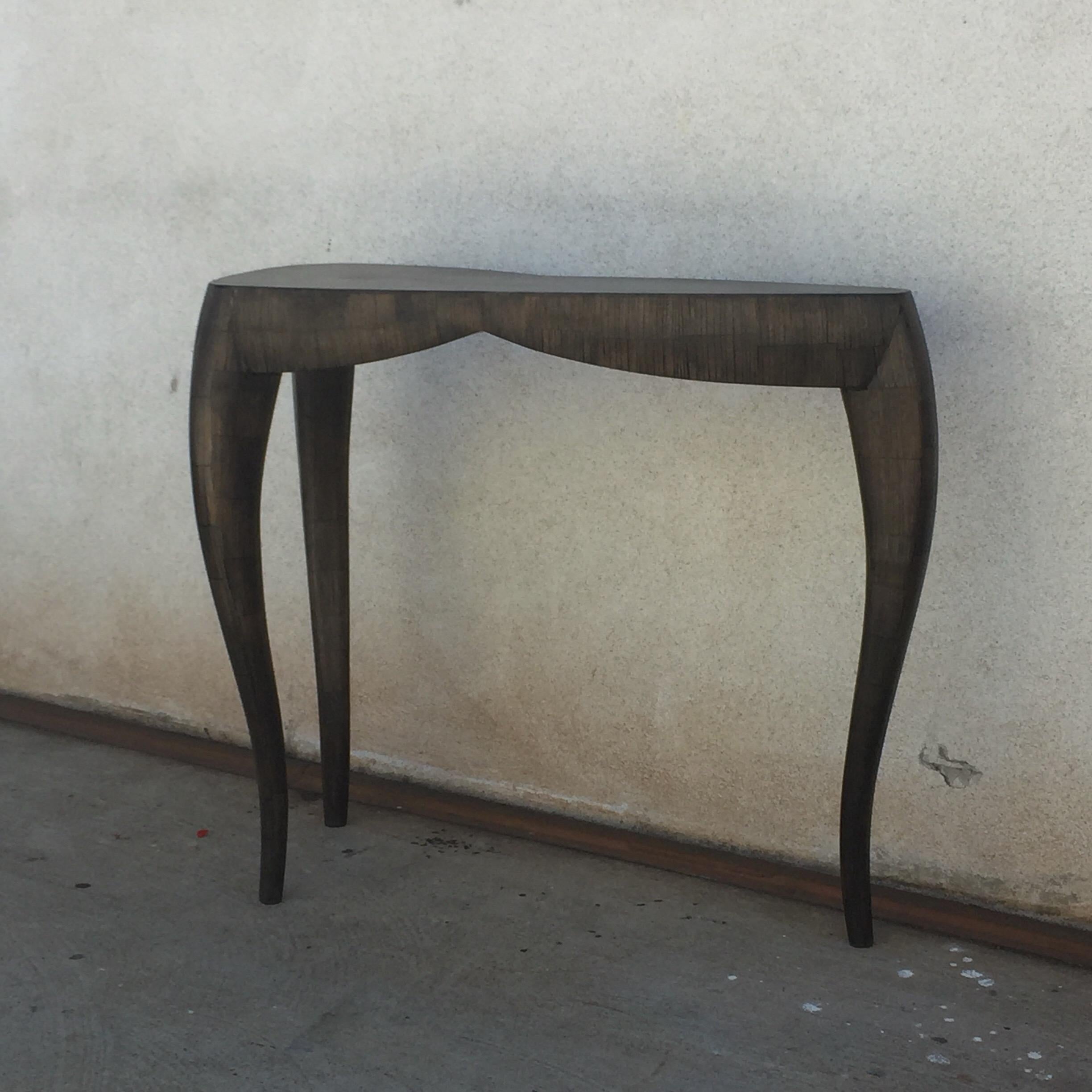 Elegant freeform console by Ria & Youri Augousti, Paris.

Original tag.