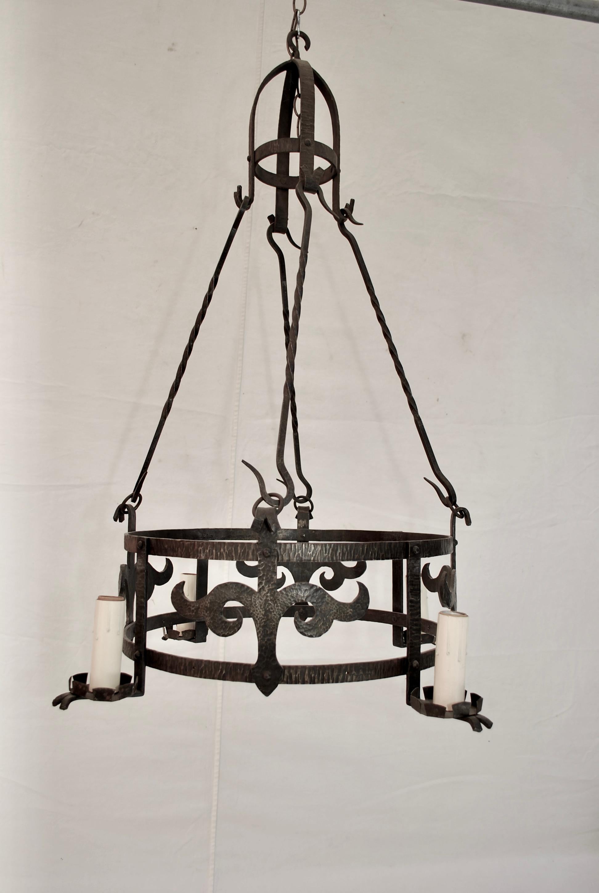 A beautiful French 1920's  all hands forged wrought iron chandelier, the patina is so much nicer in person