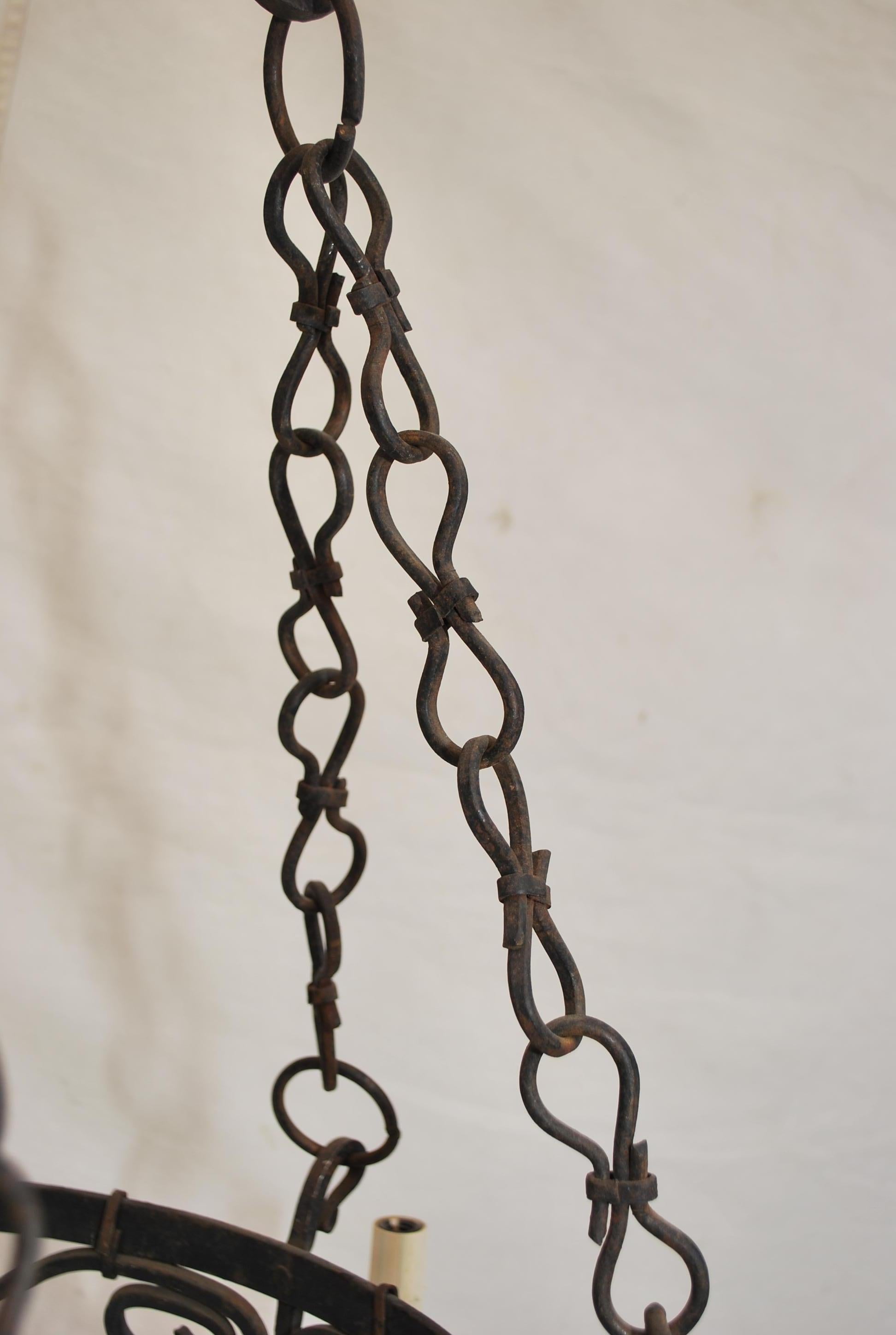 Elegant French 1920's hands made wrought iron chandelier In Good Condition For Sale In Los Angeles, CA