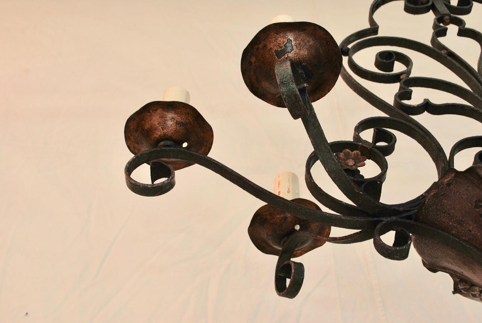 Wrought Iron Elegant French 1930s Iron Chandelier in the Manner of Maison Baguès For Sale