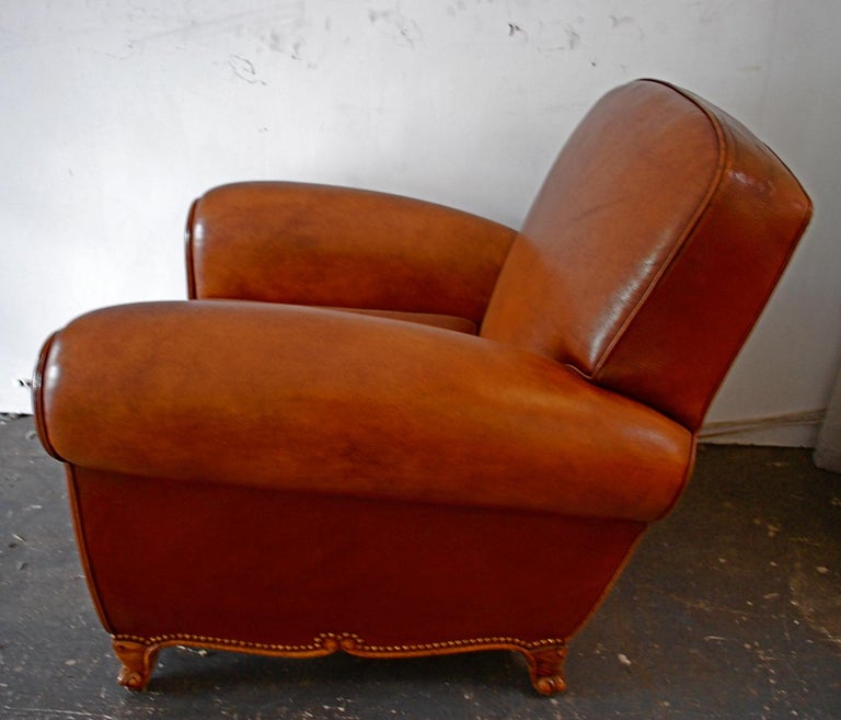 A beautiful 1950's french club chair, the patina is much nicer in person.