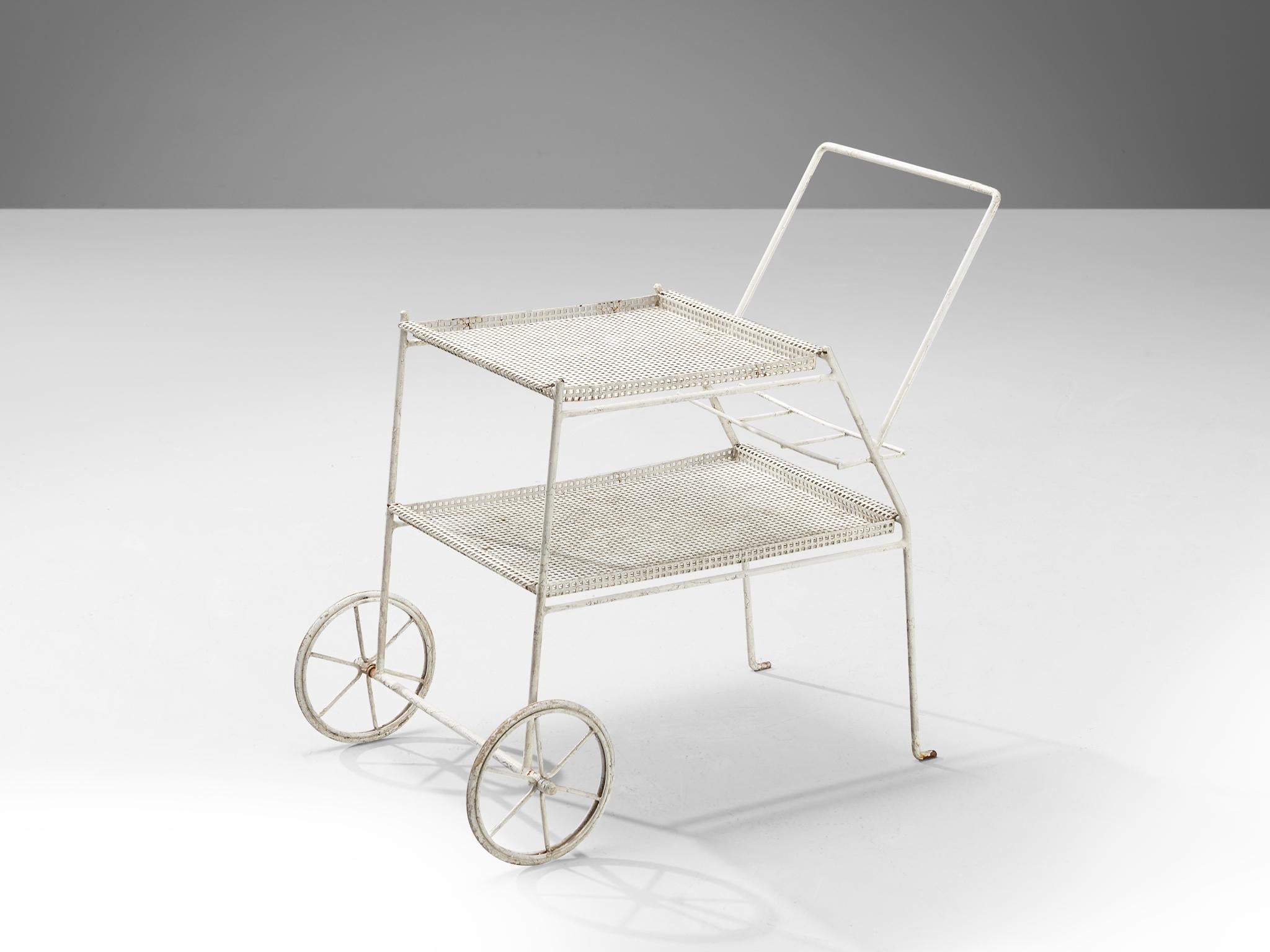 Bar cart, white lacquered iron, France, 1970s

This delicate bar trolley shows similarities with the designs by Mathieu Matégot for Artimeta. The open framework, in combination with the mesh material and the use of only one color enhances its