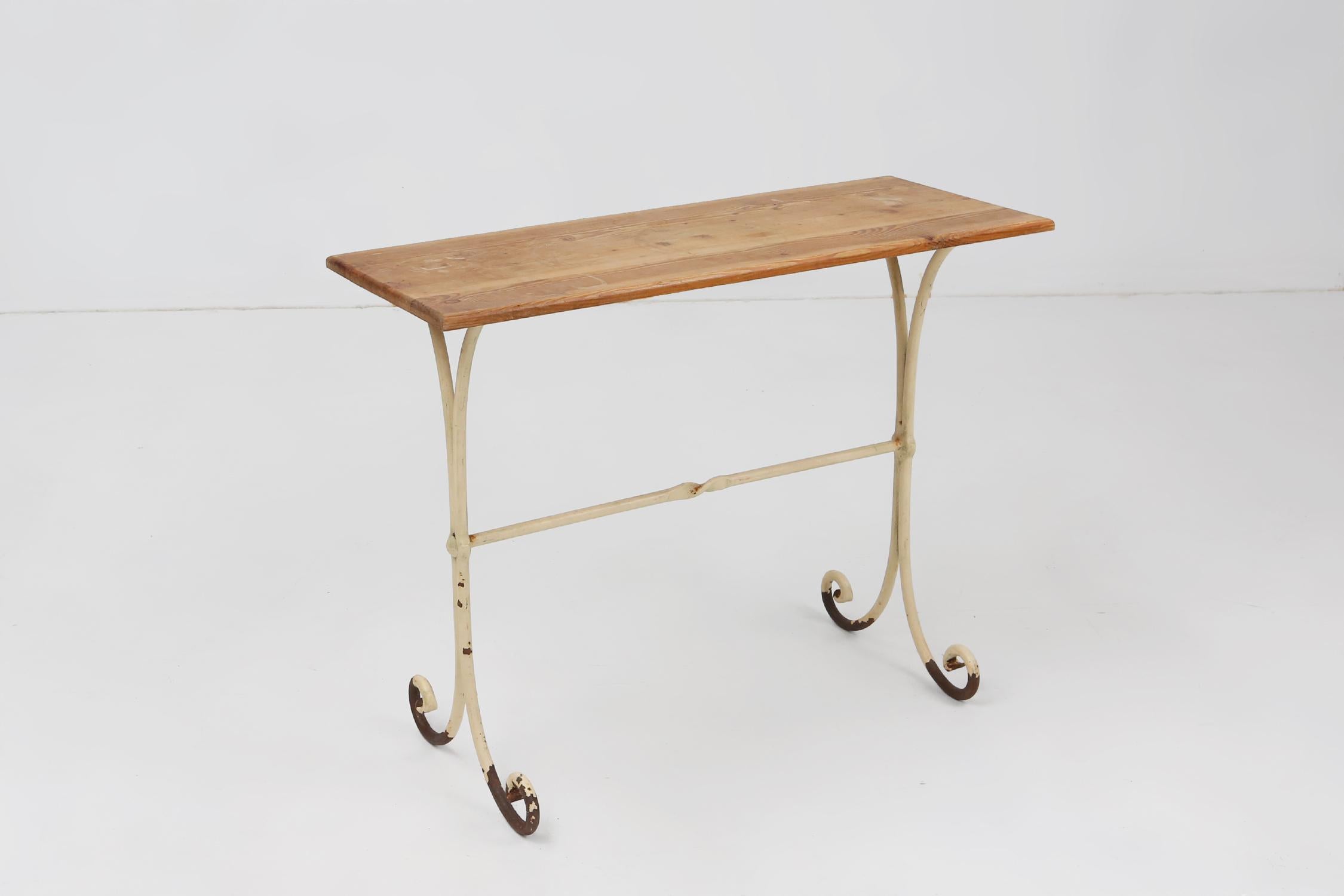 Rustic Elegant French bistro table with beige metal base and oak top, ca. 1950 For Sale
