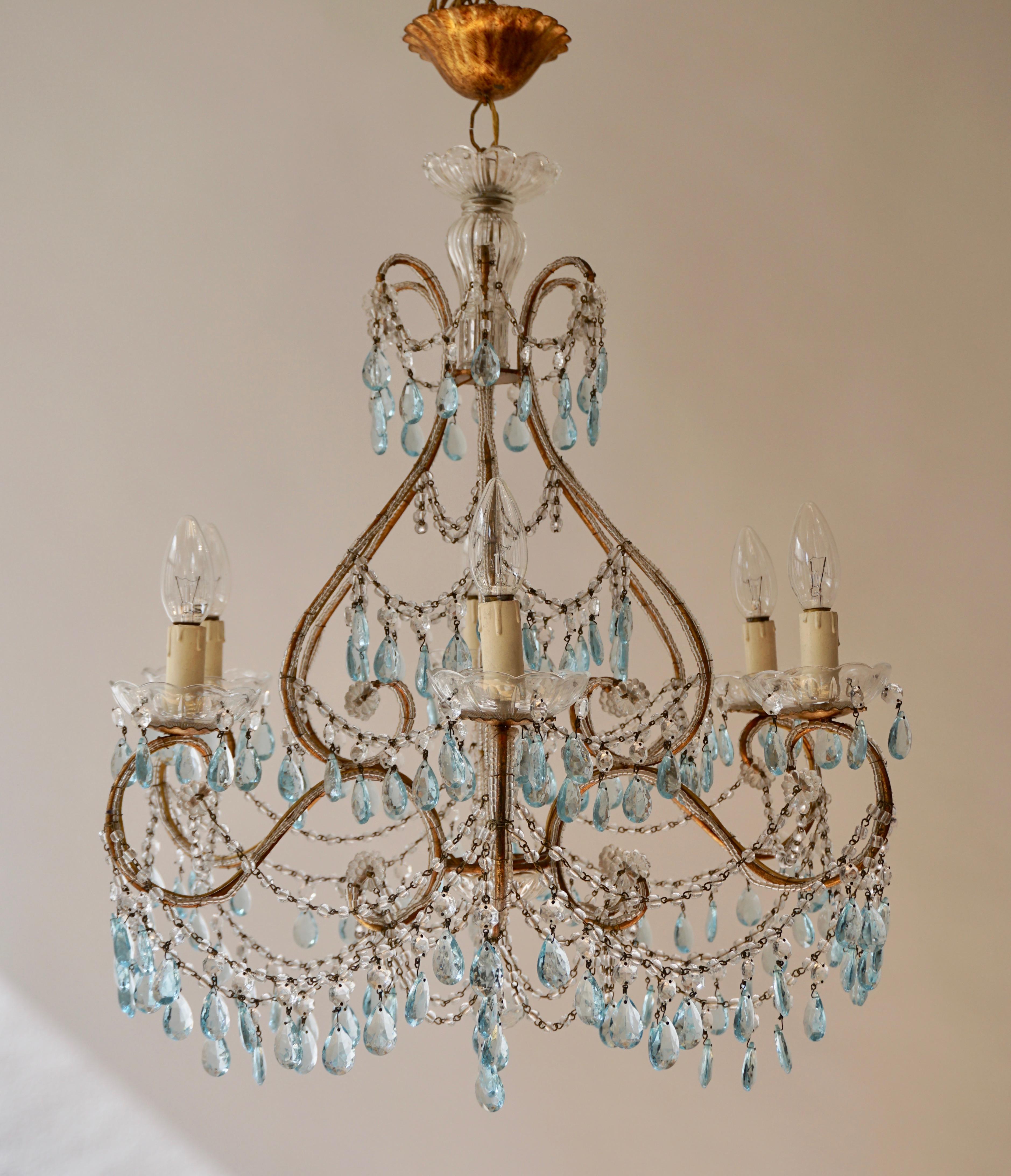Midcentury French Marie Therese blue 6-light crystal chandelier.
Dating back to 1950s. Wired for EU.
Measures: Diameter 59 cm.
Height fixture 65 cm.
Total height 75 cm.
