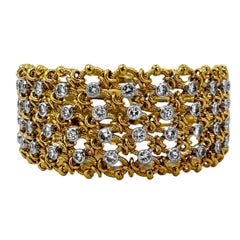 Elegant French Cartier 18K Yellow Gold and Diamond Bracelet Over One Inch Wide