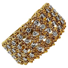 Elegant French Cartier 18K Yellow Gold and Diamond Bracelet Over One Inch Wide