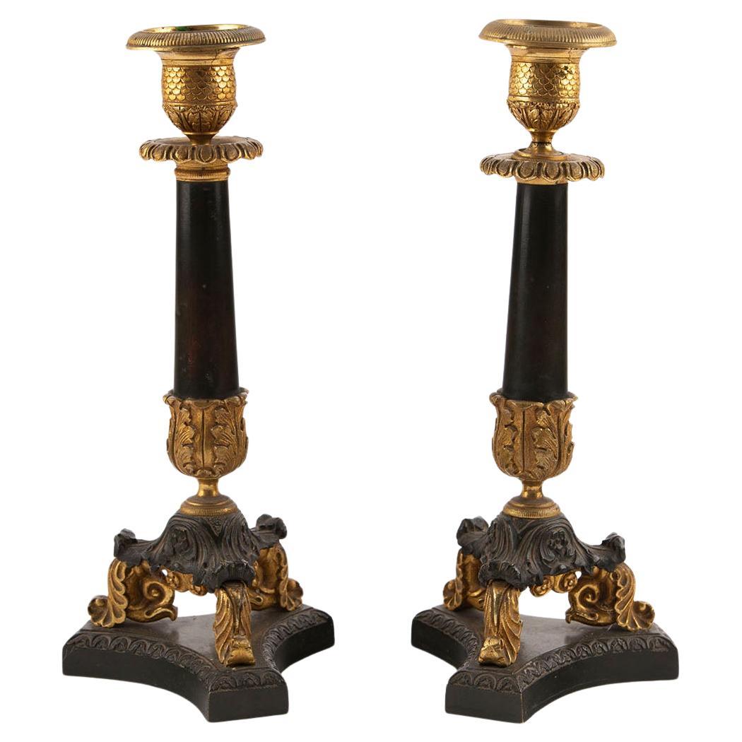 Eleganza dei candelieri impero francesi in bronzo dorato e patinato, XIX secolo