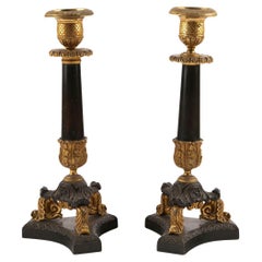 Eleganza dei candelieri impero francesi in bronzo dorato e patinato, XIX secolo