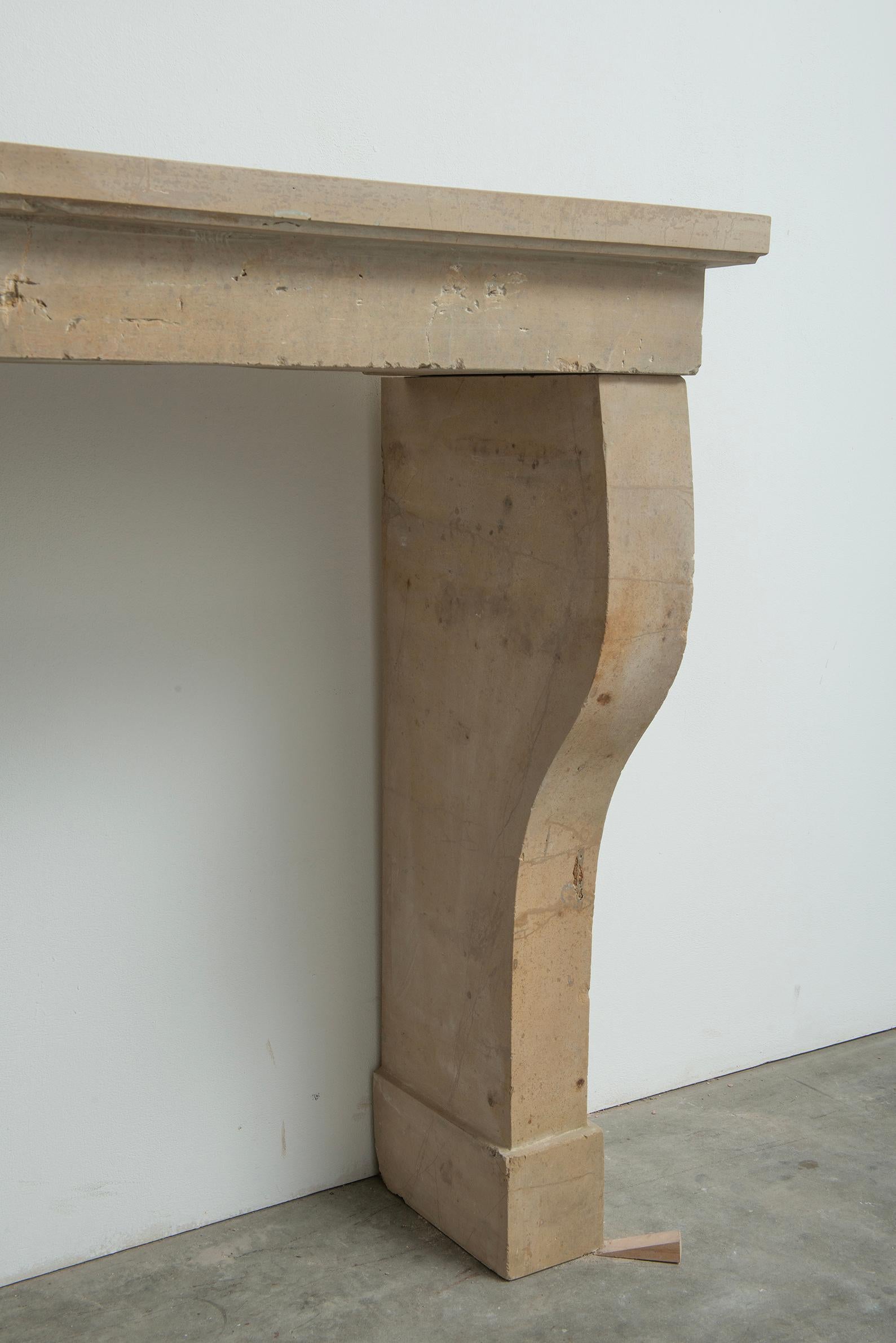 19th Century Elegant French Limestone Mantel – Timeless Country House Charm For Sale