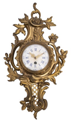 Elegant French Louis XV Style Gilt Metal Cartel Clock