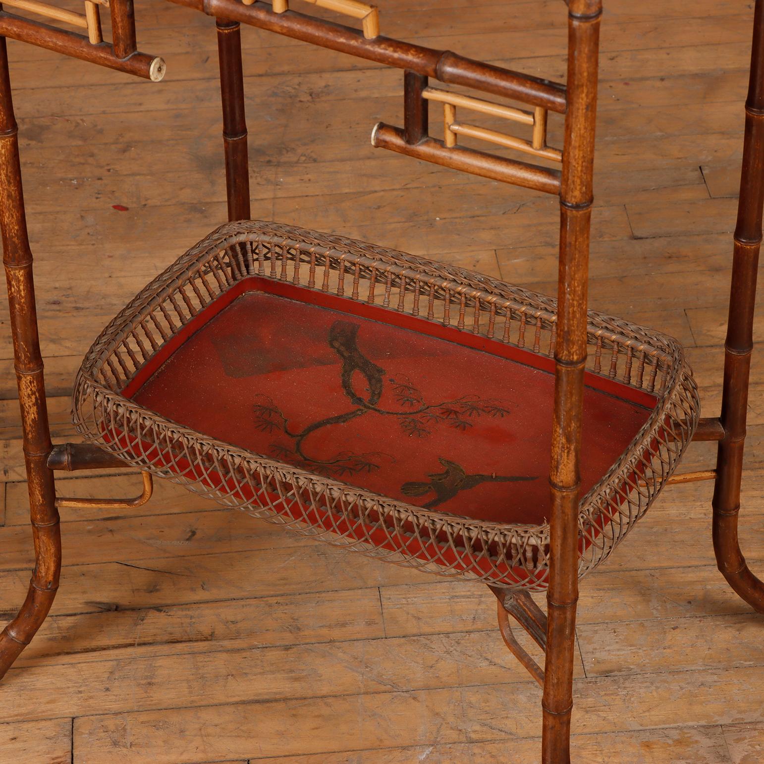 20th Century Elegant French rattan and lacquered wood table C 1920 in the Japanese style.