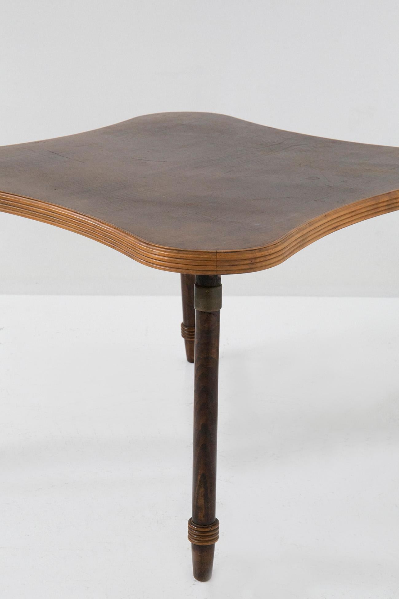 Step into a world where beauty and craftsmanship unite in perfect harmony - behold the breathtaking Italian dining or gaming table, a timeless treasure attributed to the revered Luigi Scremin from the illustrious 1950s. Prepare to be mesmerized by
