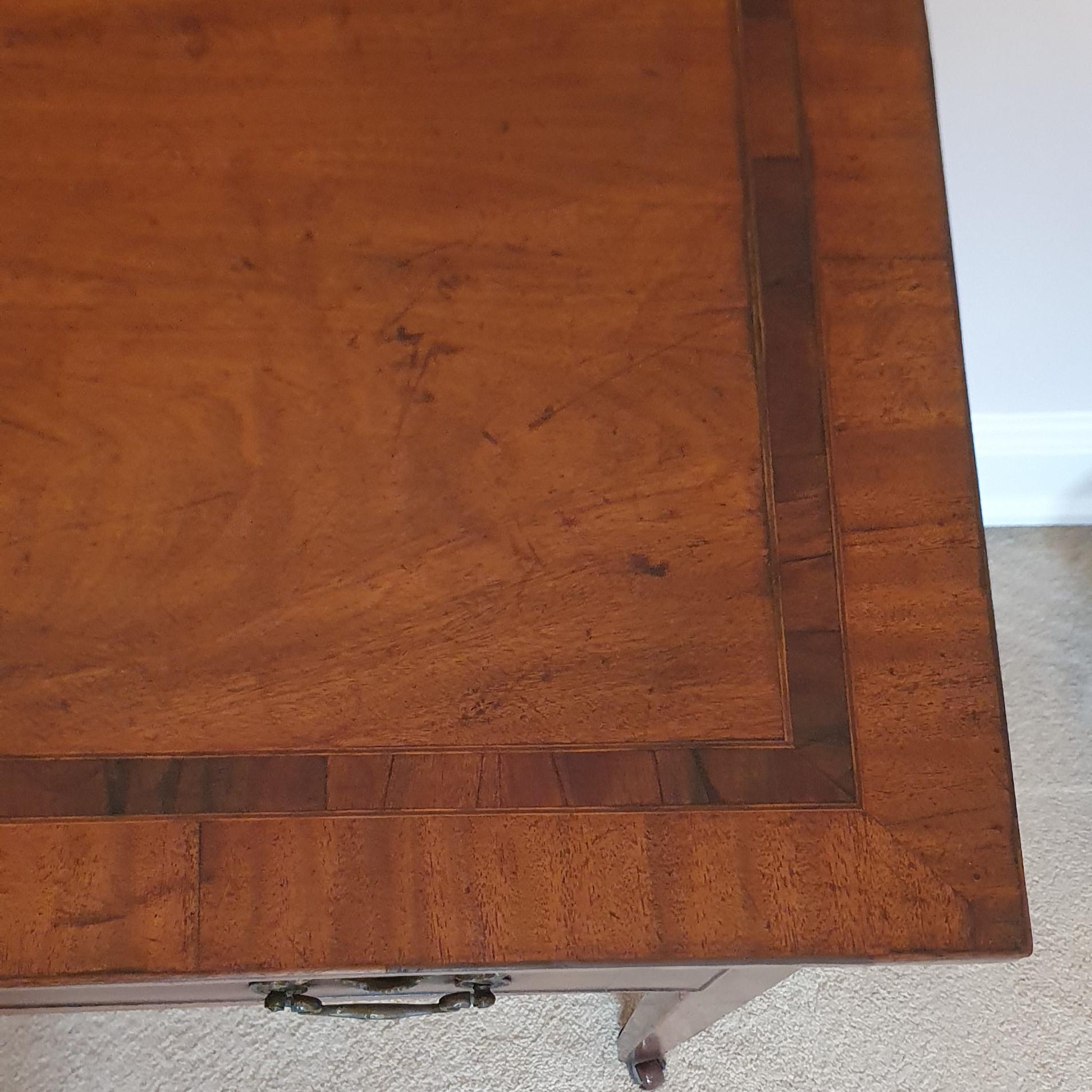 Fruitwood Elegant George III style lowboy with three drawer and delicate marquetry top For Sale