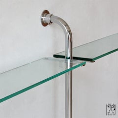 Elegant German minimalist Bauhaus tubular steel shelve with transparent glass