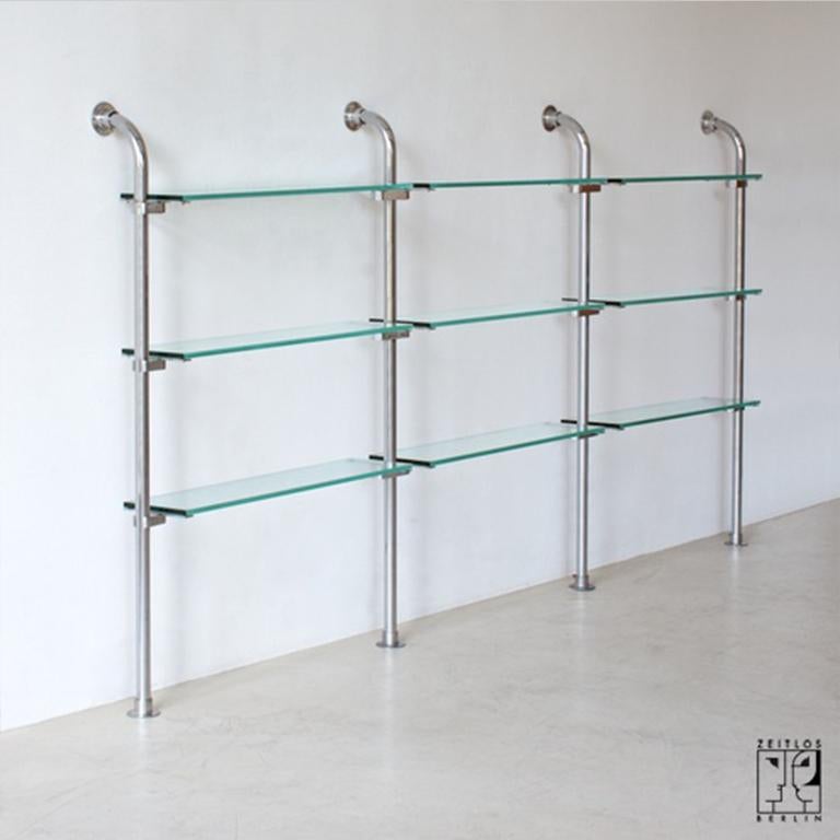 Galvanized Elegant German minimalist Bauhaus tubular steel shelve with transparent glass For Sale