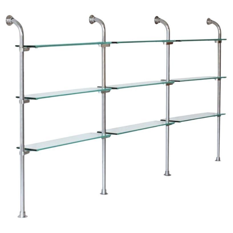 Elegant German minimalist Bauhaus tubular steel shelve with transparent glass For Sale