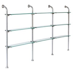 Elegant German minimalist Bauhaus tubular steel shelve with transparent glass