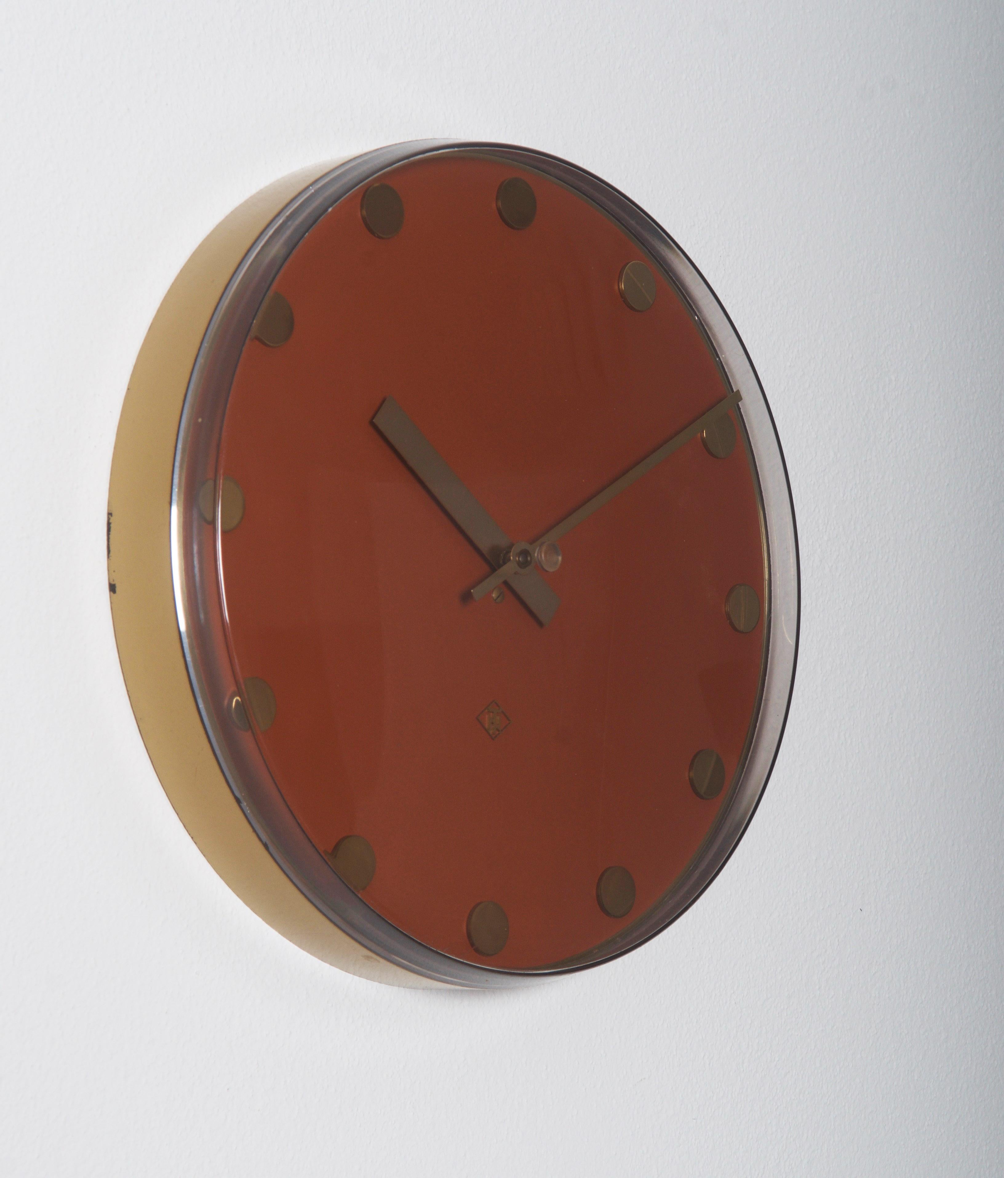 Body made of steel with plexiglas clock face and brass clock hands made by TN Telenorma in the late 1970s. 
Formerly a station or factory slave clock, it is now fitted with a modern quartz movement with a battery.
Delivery time 2-3 weeks.
