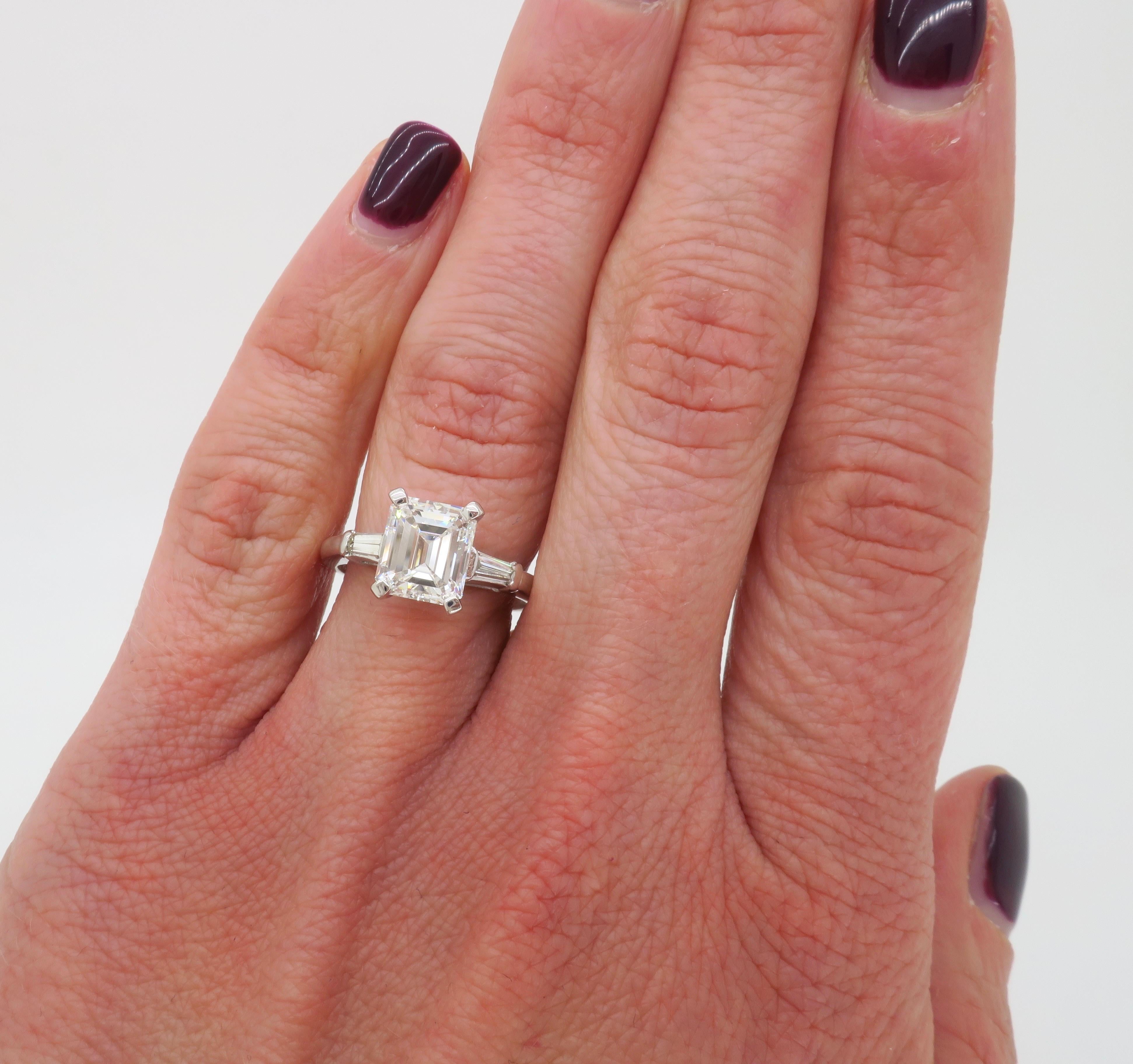 emerald cut diamond with baguettes engagement rings