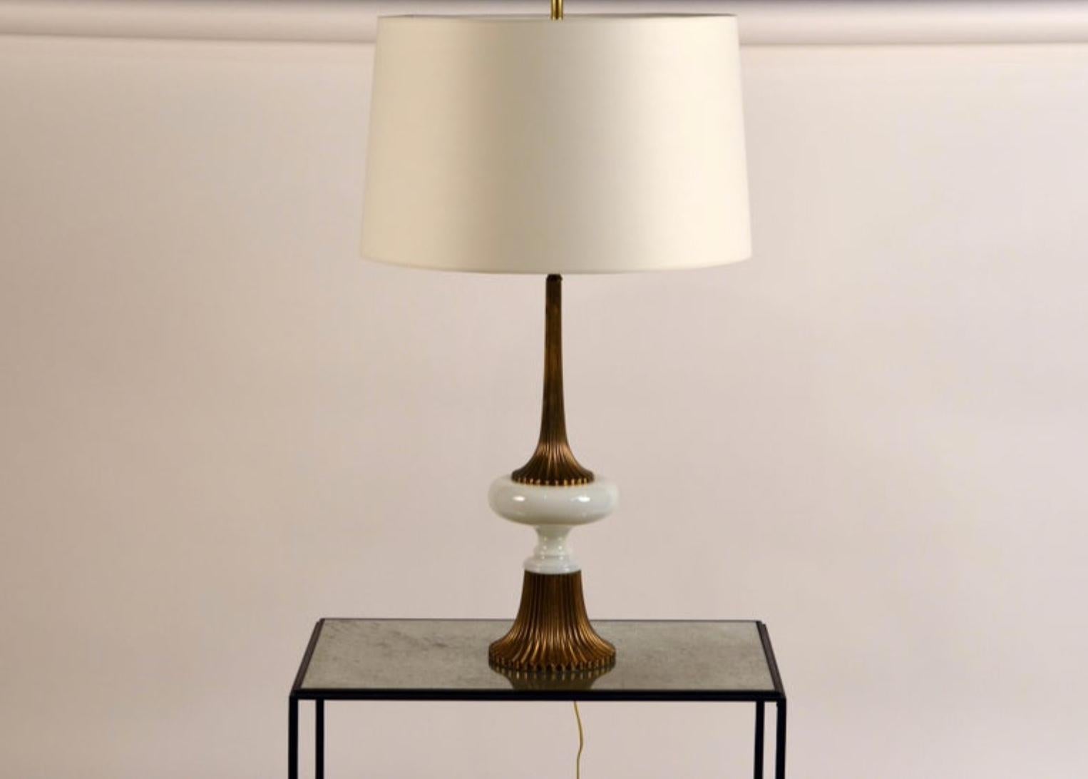Elegant gilt bronze and white opaline Hollywood Regency lamp in the style of Tony Duquette.

Custom paper shade (19 in. diameter at top x 21 in. diameter at bottom x 12.5 in. tall) not included, but could be added for an additional $300 at