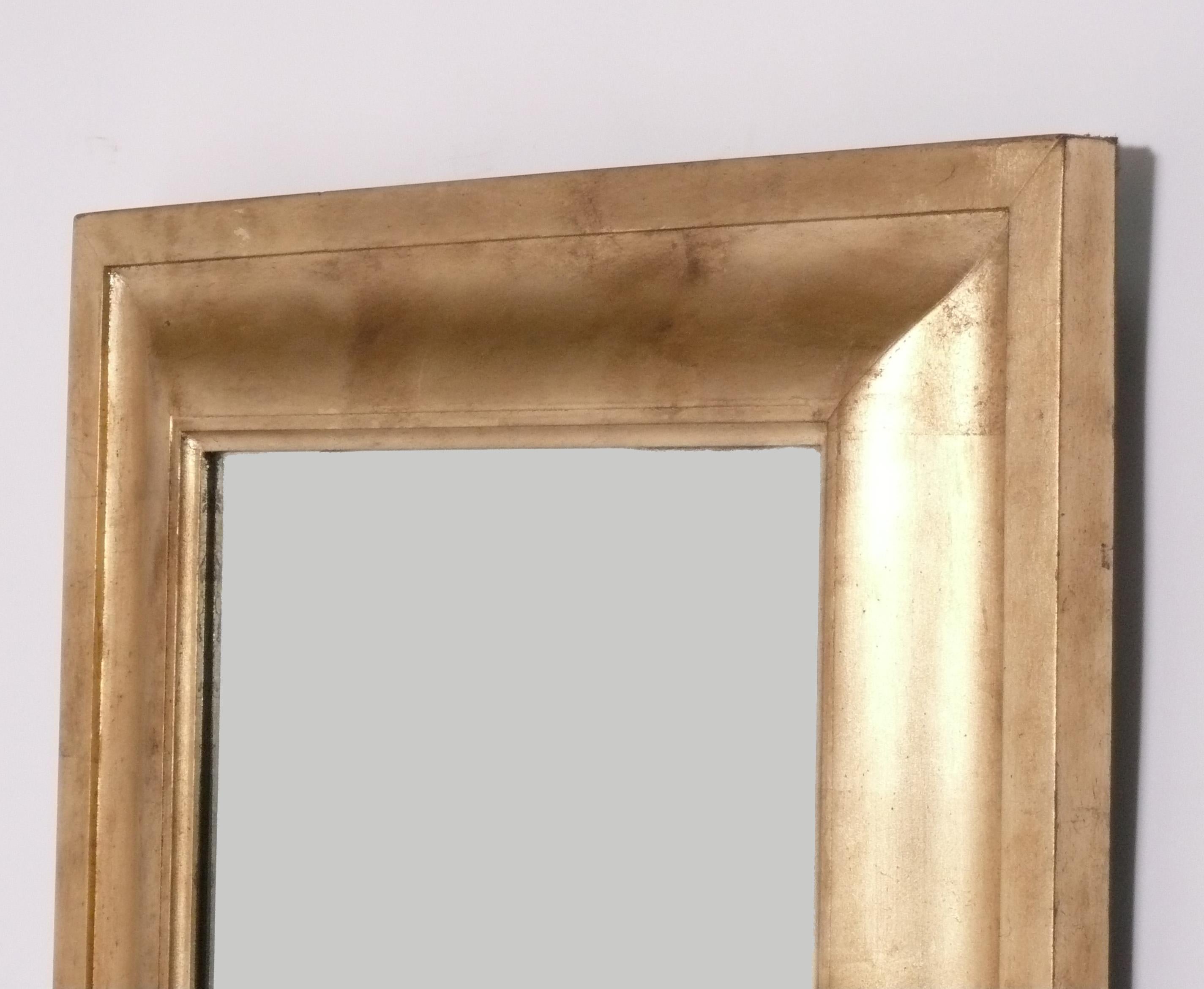 Doré Elegants miroirs dorés circa 1950s en vente