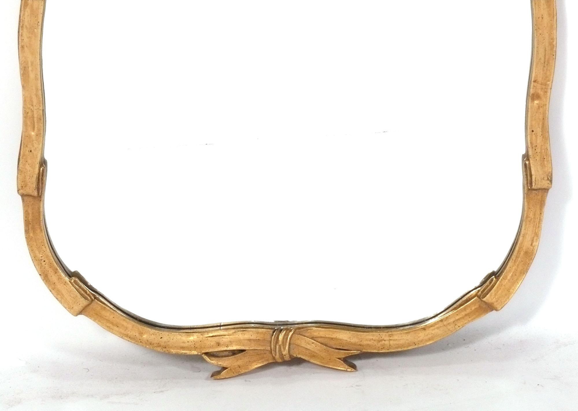 Hollywood Regency Elegant Gilt Ribbon Form Mirror from The Carlyle Hotel For Sale