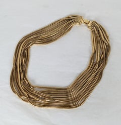Elegant Gilt Snake Chain Draped Necklace