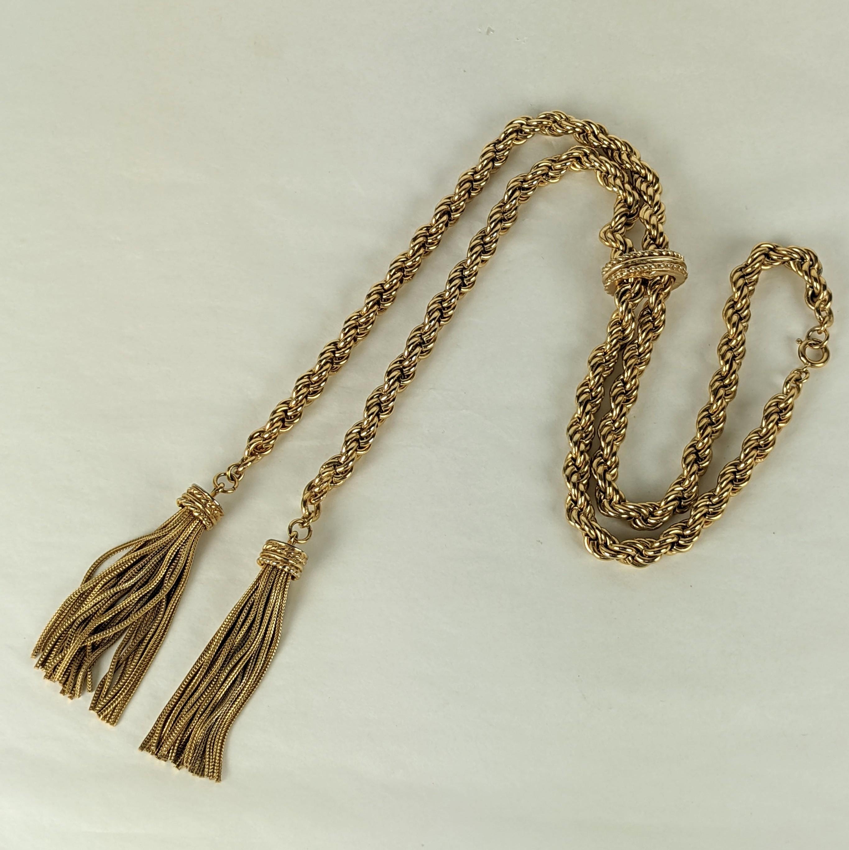 Elegant Gilt Tassel Slide Necklace from the 1950's USA. Center slide allows for lengths to be varied and different options for wear. Closure on back for entry. Heavy quality piece. 36