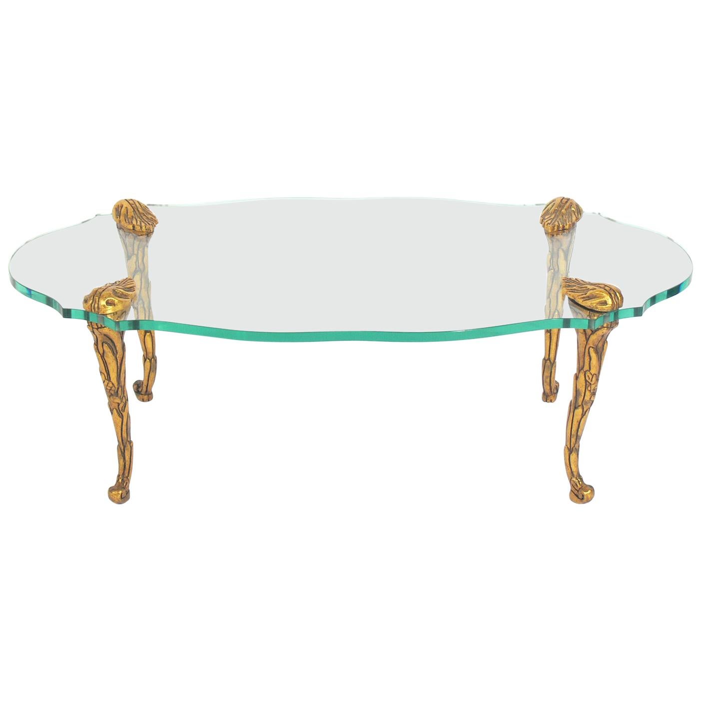 Élégante table basse en bois doré et verre