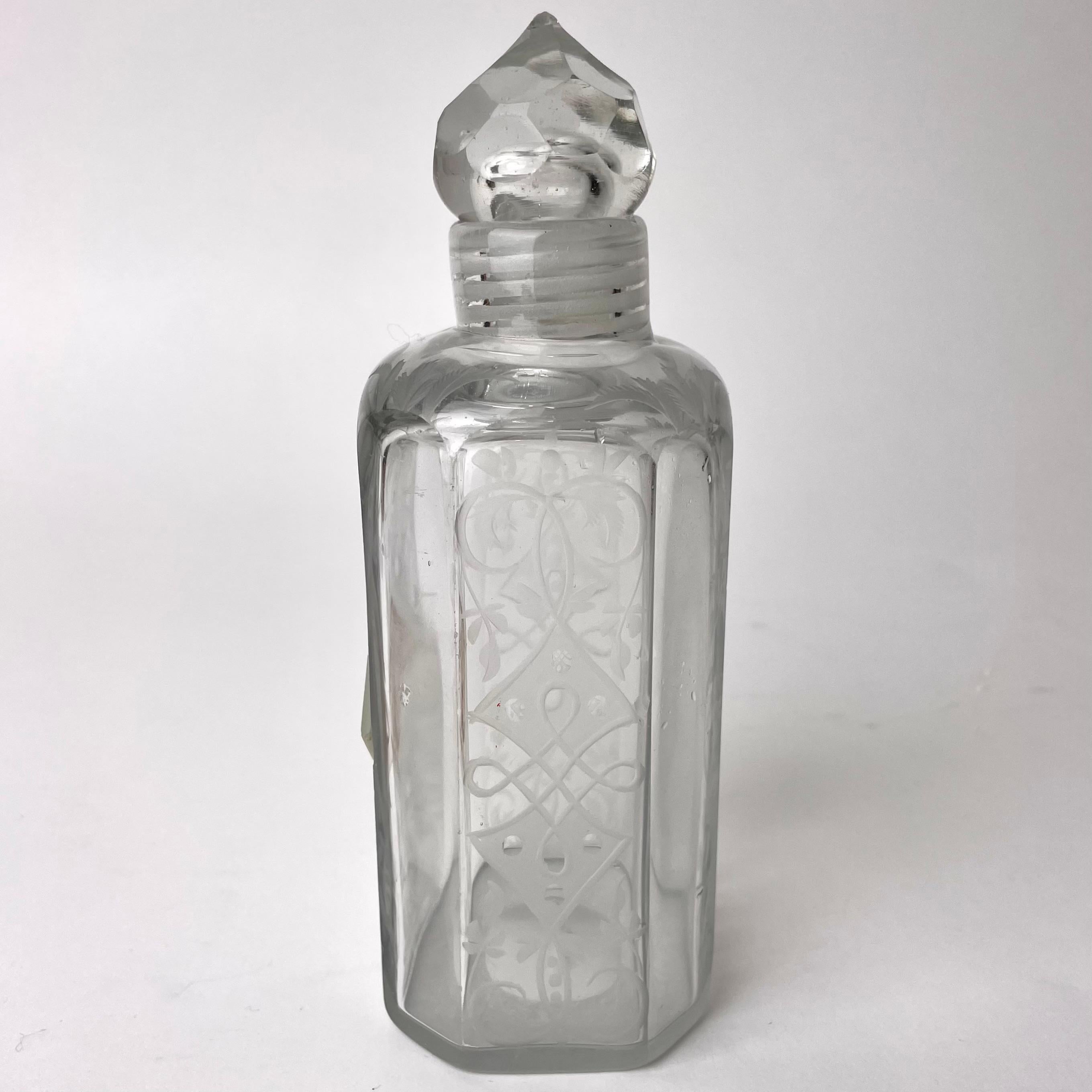Engraved Elegant Glass Bottle with glass screw cap probably from the 18th Century For Sale