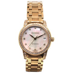 Elegante Damenuhr aus Gold und Diamanten von Bucherer, Schweiz