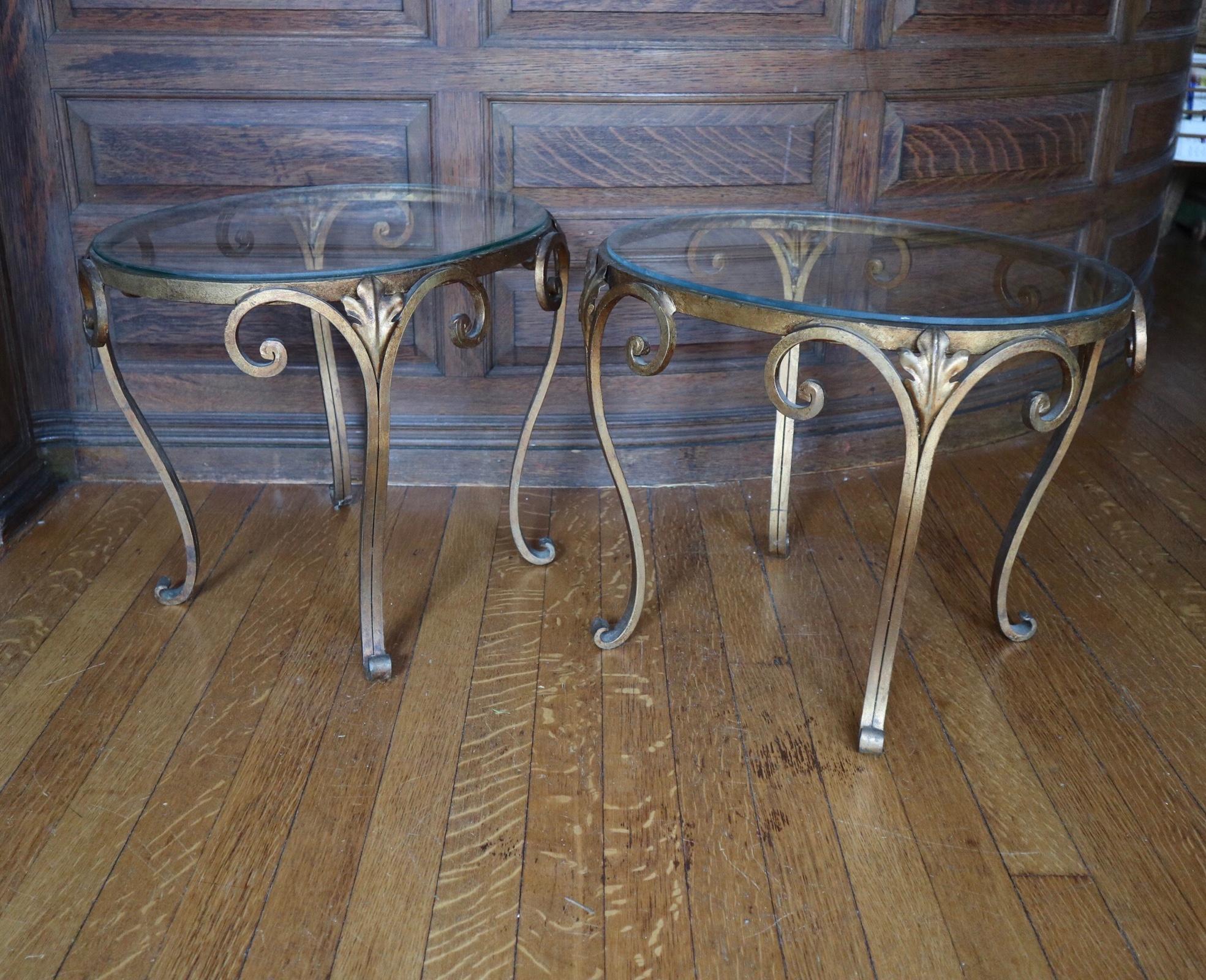 Elegant gold/gilt/gilded and glass side tables or bedside tables. In good condition. No chips to glass. Can support normal lamps or pottery.