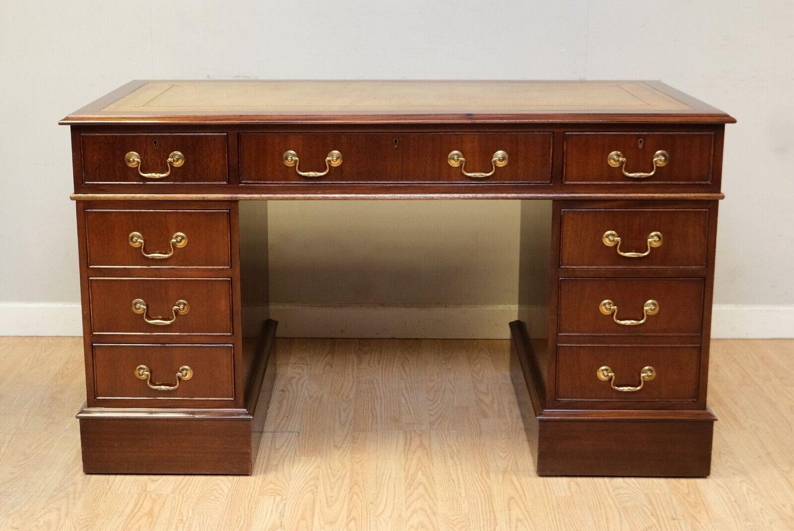 We are delighted to offer for sale this classic Mahogany brown desk with light brown leather top and gold tooling. 

This good looking desk is ideal for your office or for it to be placed at your home as the colour and design will add style. The