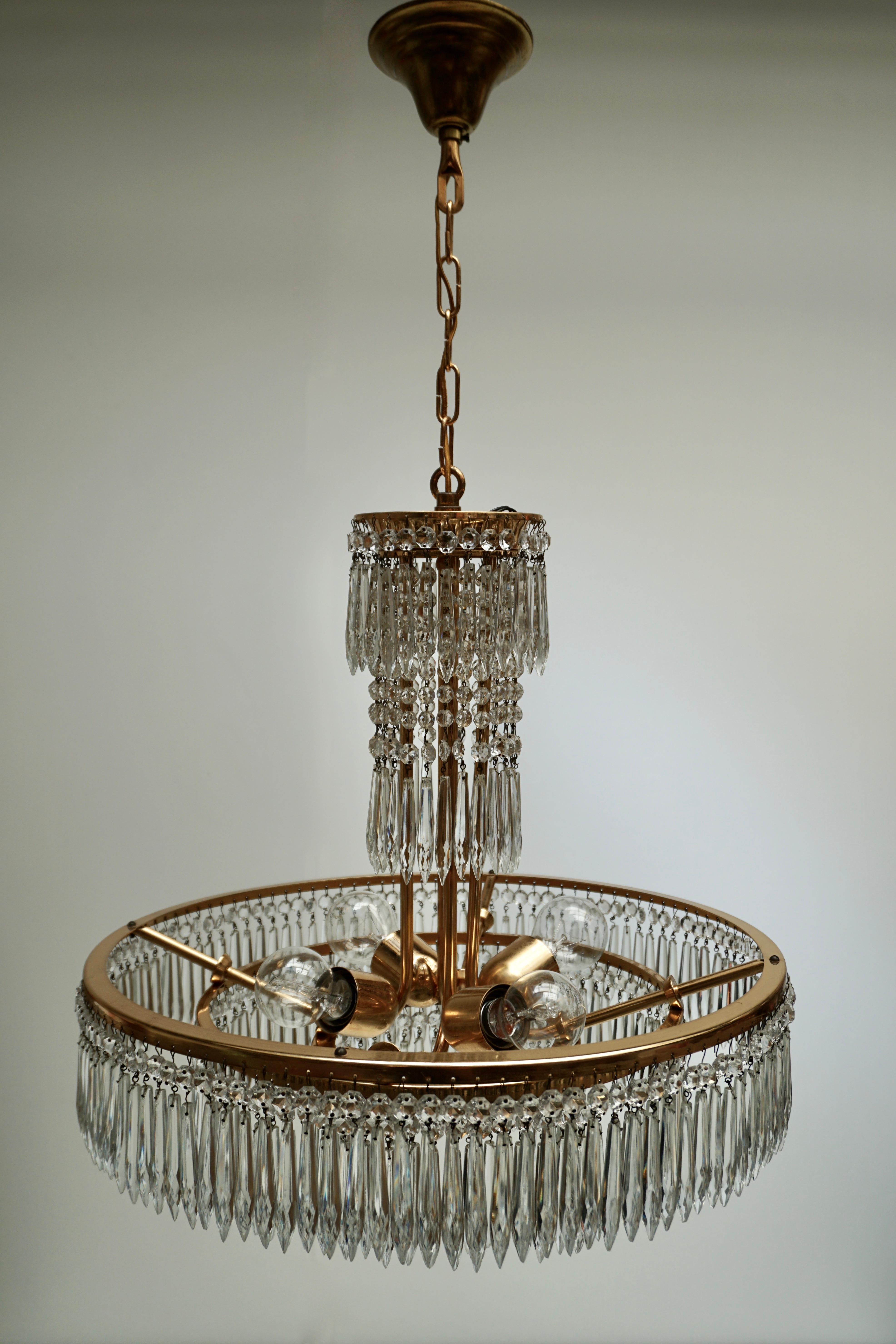 Elegant Hollywood Regency Crystal and Brass Chandelier 1