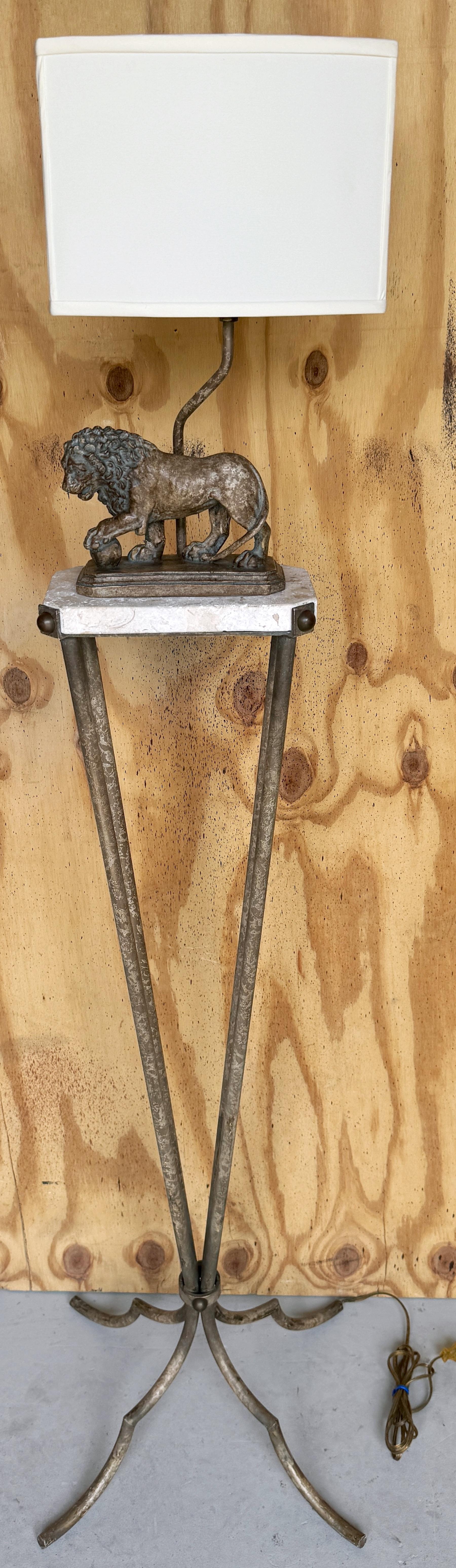 Elegant Mid-Century Iron & Marble Medici Lion Motif Floor Lamp

Attributed to Maitland Smith, Circa 1980s

This striking mid-century floor lamp seamlessly blends classic elegance with fine craftsmanship. Standing at an impressive 60” overall height,
