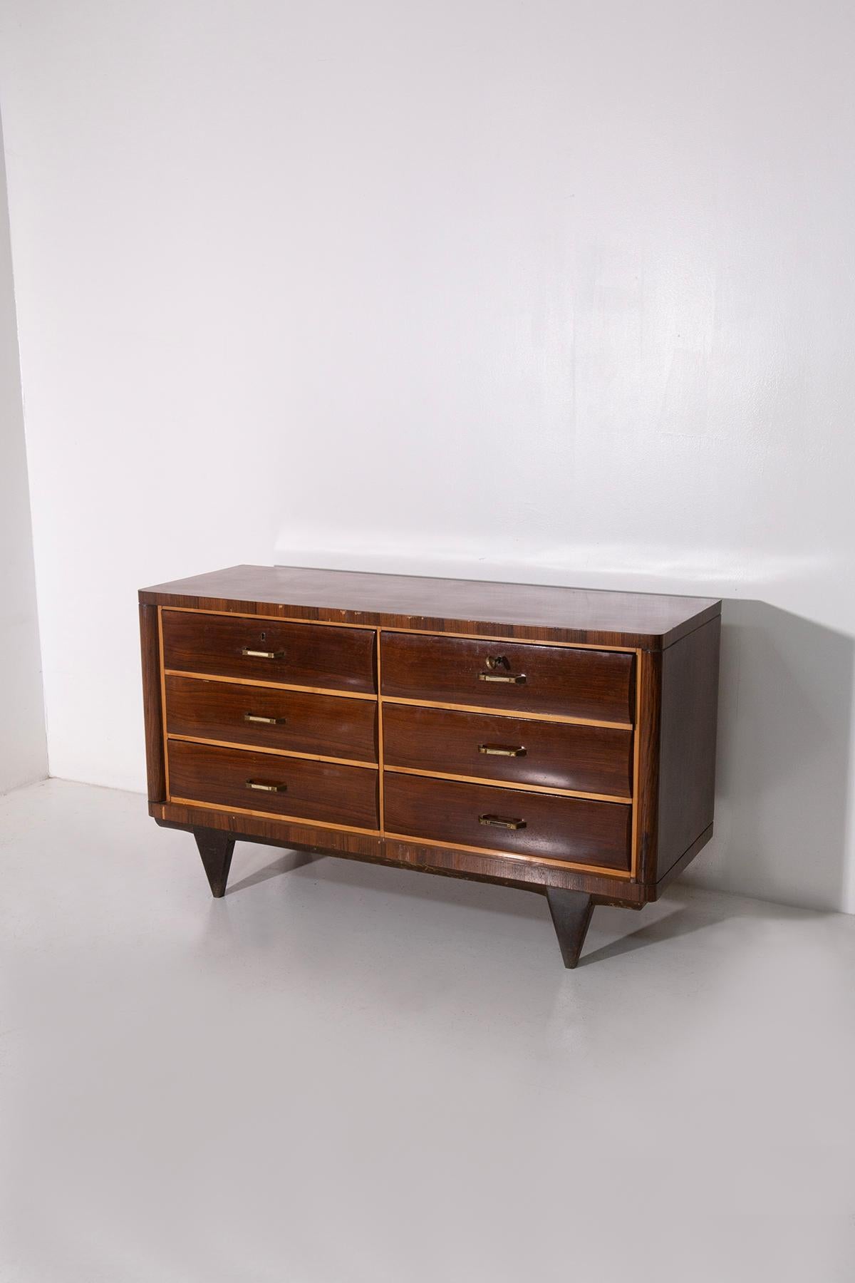 A truly elegant and refined Italian Art Deco chest of drawers, this piece captures the essence of early 20th-century craftsmanship with its timeless lines, luxurious materials, and sculptural form. Designed with both aesthetics and function in mind,