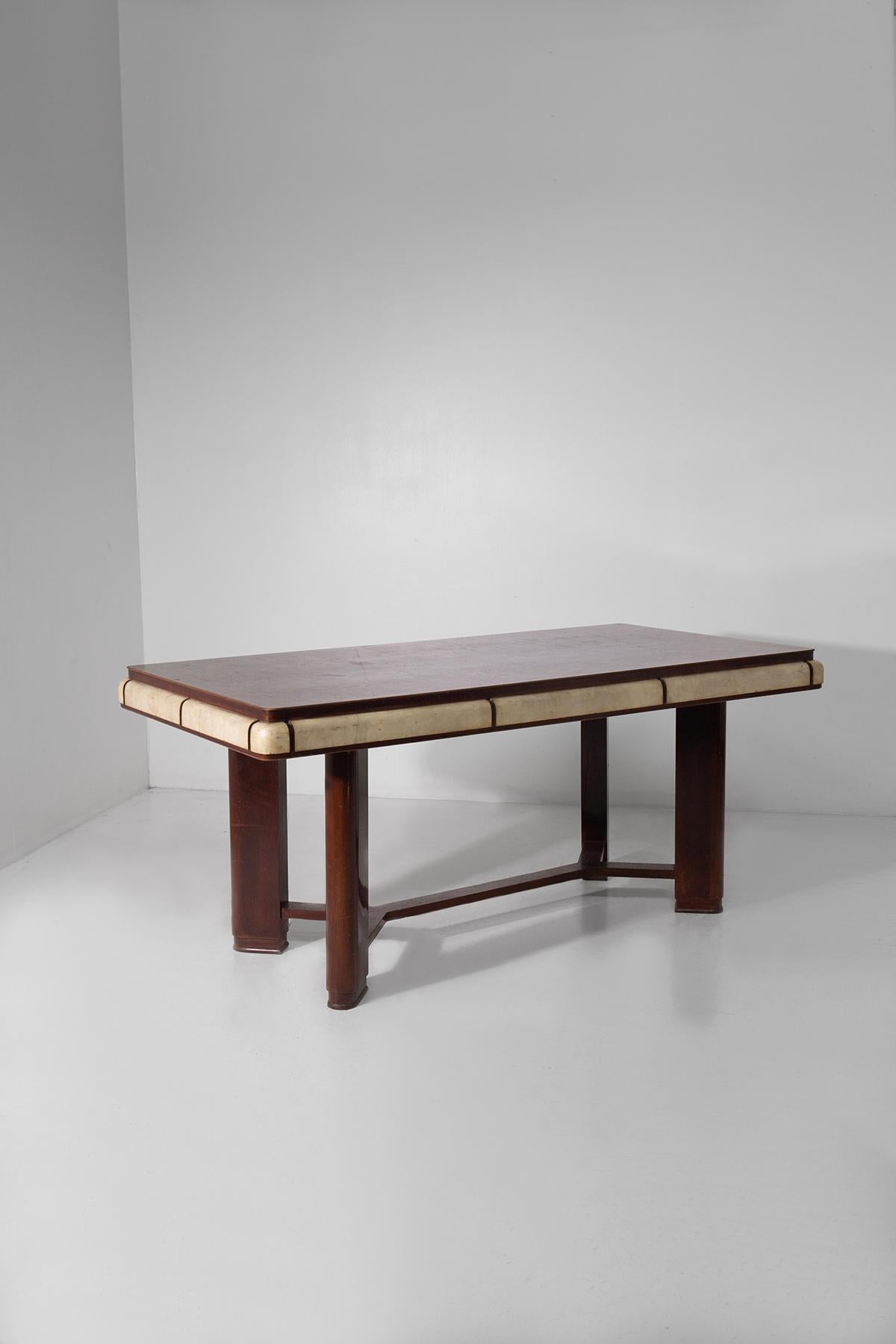 Elegant Italian Art Deco table in wood and parchment - Original design from the 1930s
Bring timeless style and architectural elegance to your space with this charming Italian Art Deco table, an authentic piece from the 1930s-40s that features all