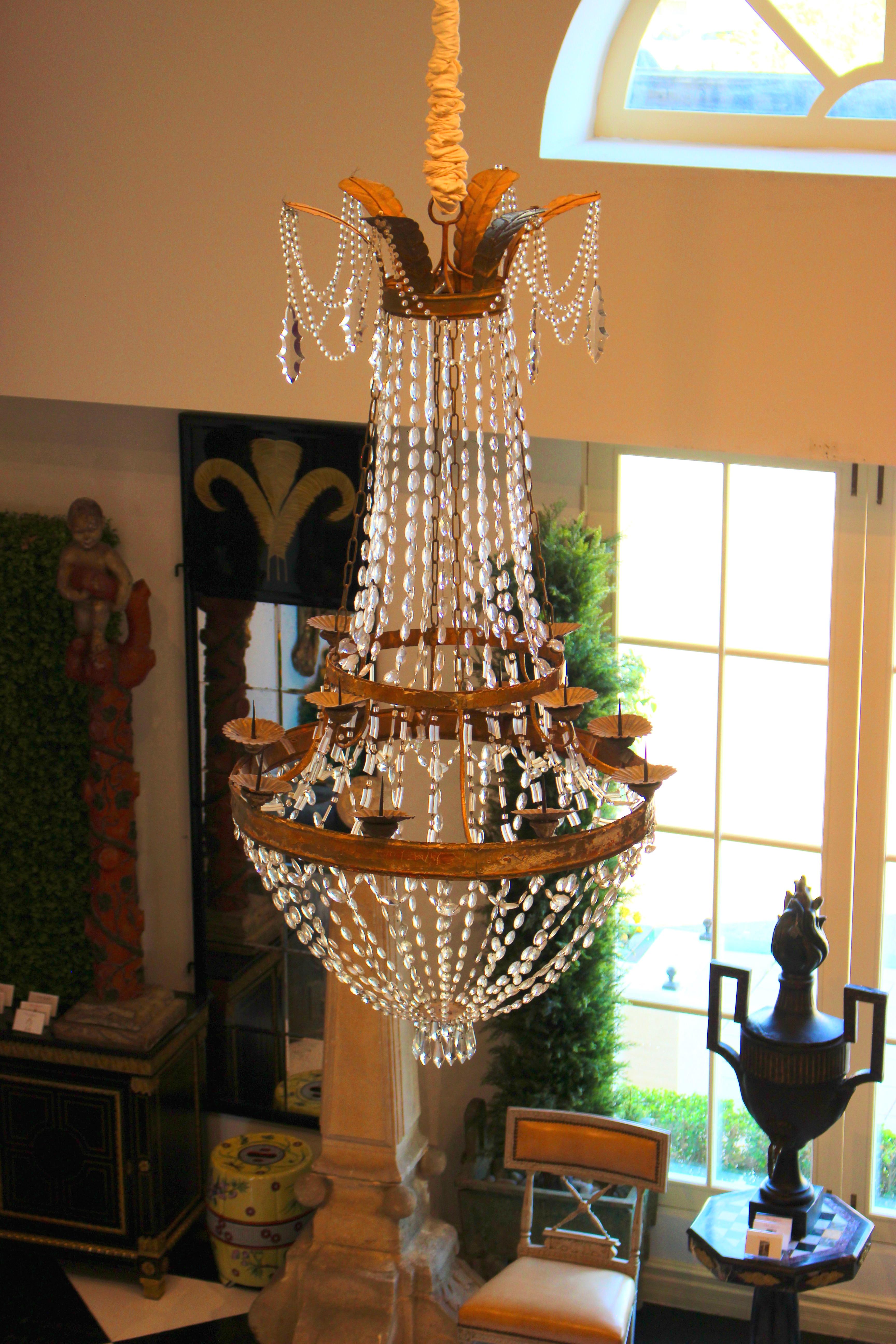 Elegant Italian beaded candele chandelier with gilded middle band. Circa 1720.