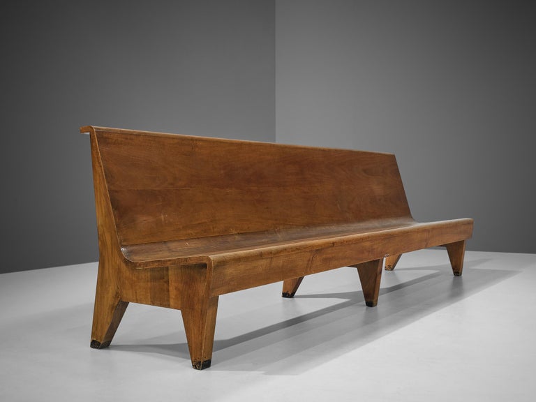 Bench, walnut, Italy, 1950s

Elegant Italian bench in walnut. Due to its monumental size and free-standing design, the bench probably originates from a church or museum context. With a width of 298 cm (117.32 in) the bench provides space for