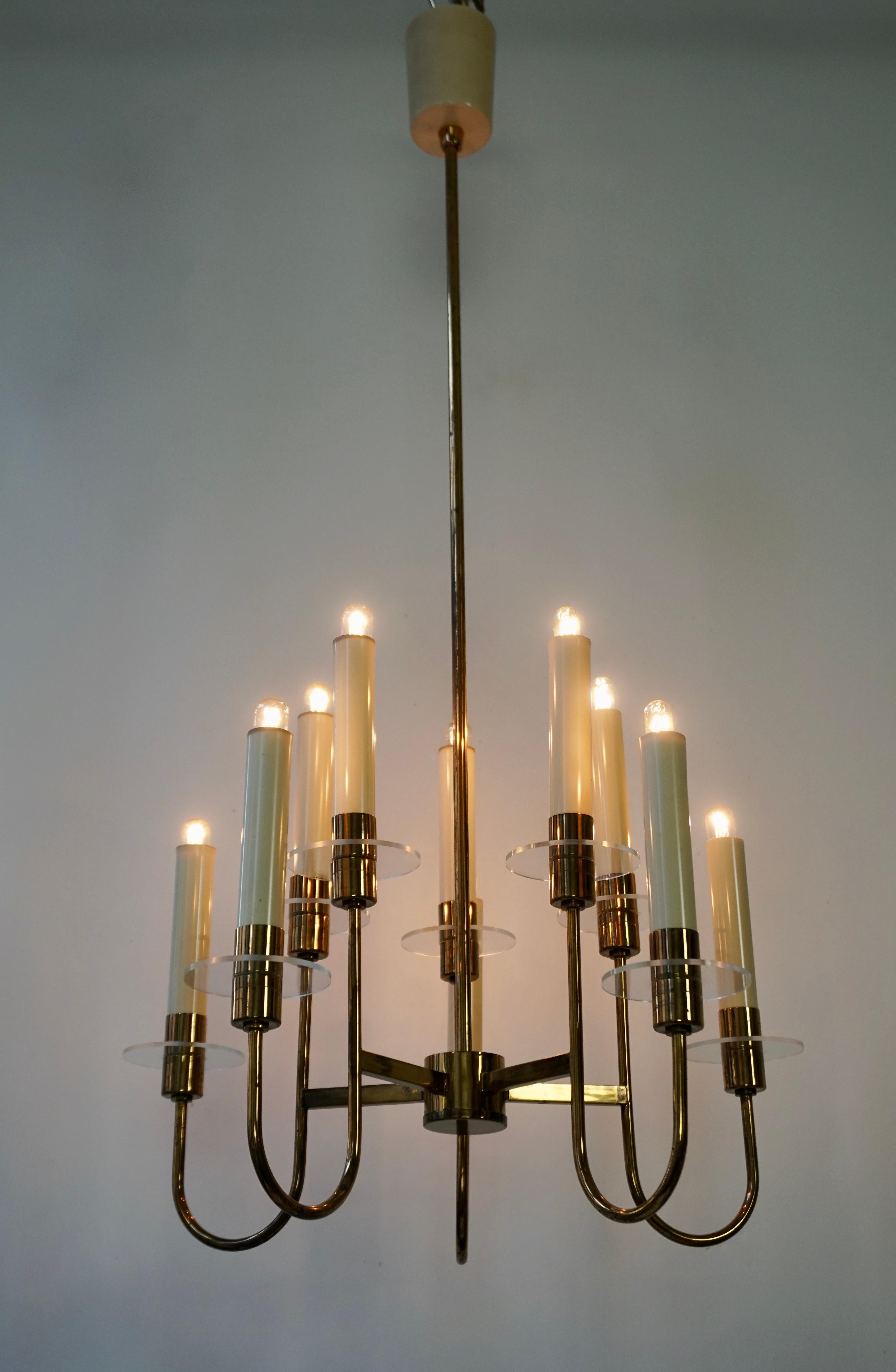 Astounding chandelier of glass and brass in the style of Leleu, Arbus, and Poillerat.

The light requires six single E27 screw fit lightbulbs (60Watt max.) LED compatible.

Measures: Diameter 45 cm.
Height 97 cm.

 