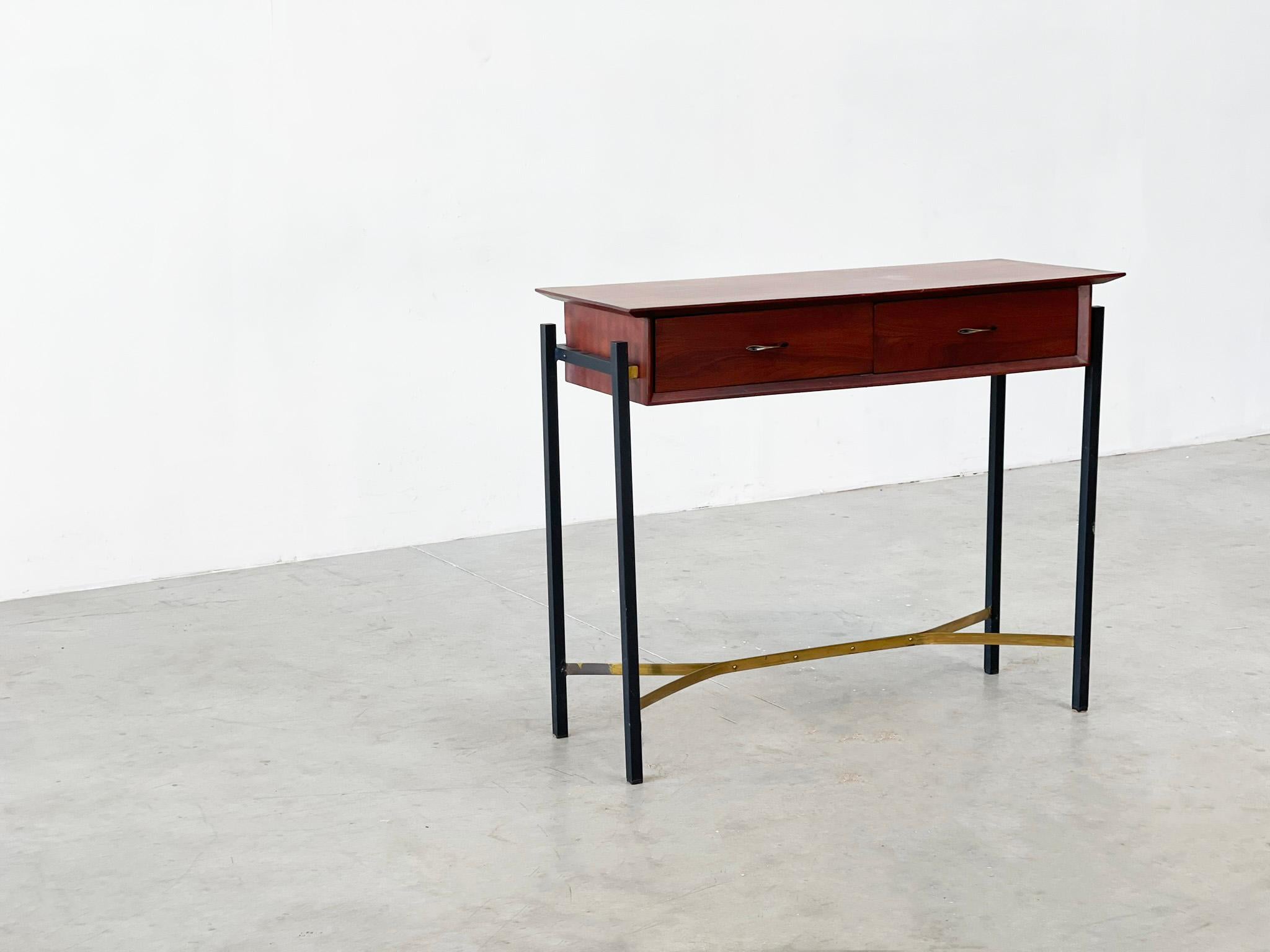 Elegant Italian console with brass details
Beautifully shaped italian console or side table. 

This was bought in Italy, it features a metal base with a wooden cabinet and brass details.

Typical example of lovely Italian design. 

