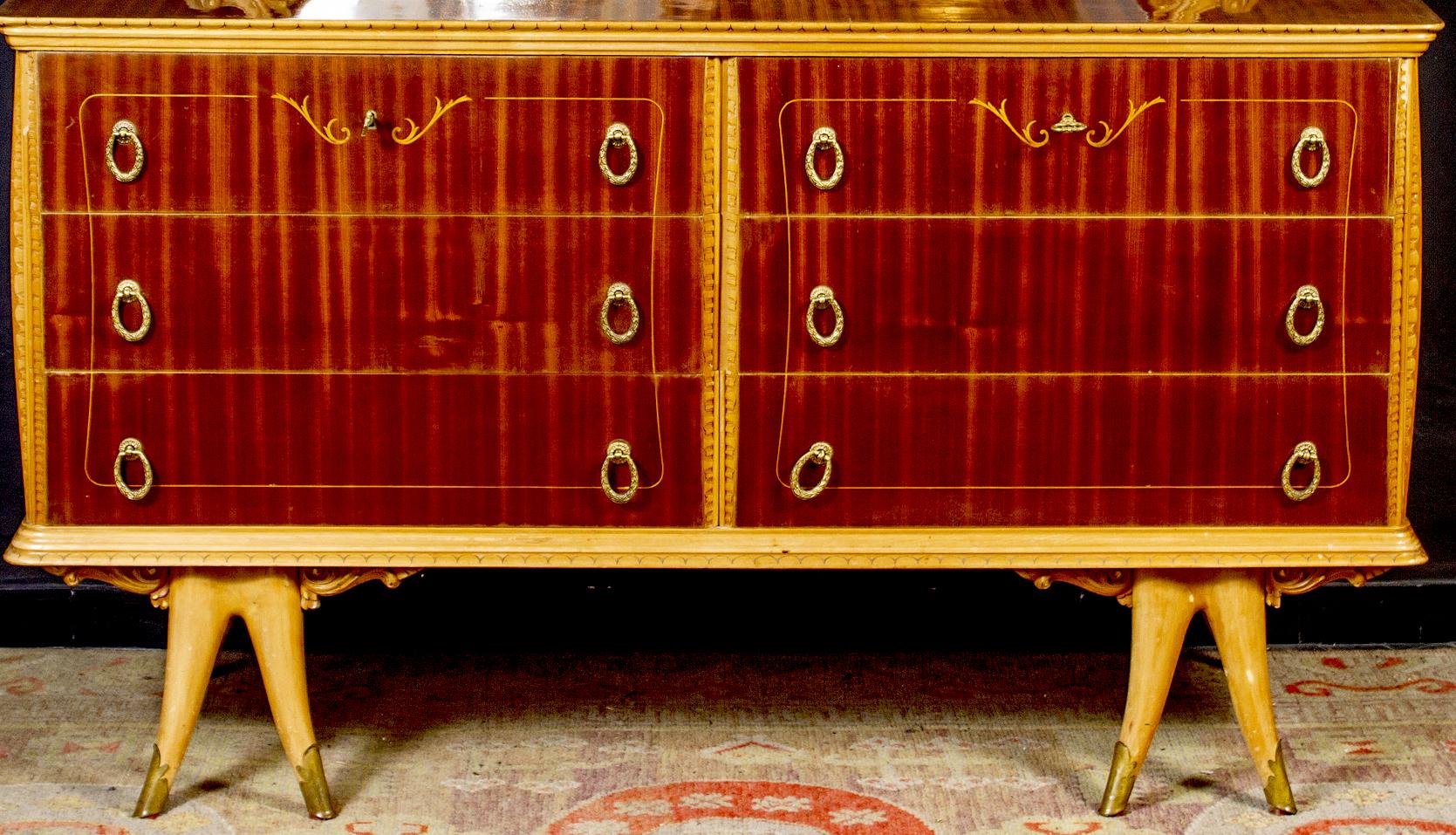 In birch and mahogany veneered with six drawers and brass handles. Available also the finely carved mirror.

Measures: Width 155 cm, height cm 88, depth cm.55
Mirror cm 130 x 90.


 